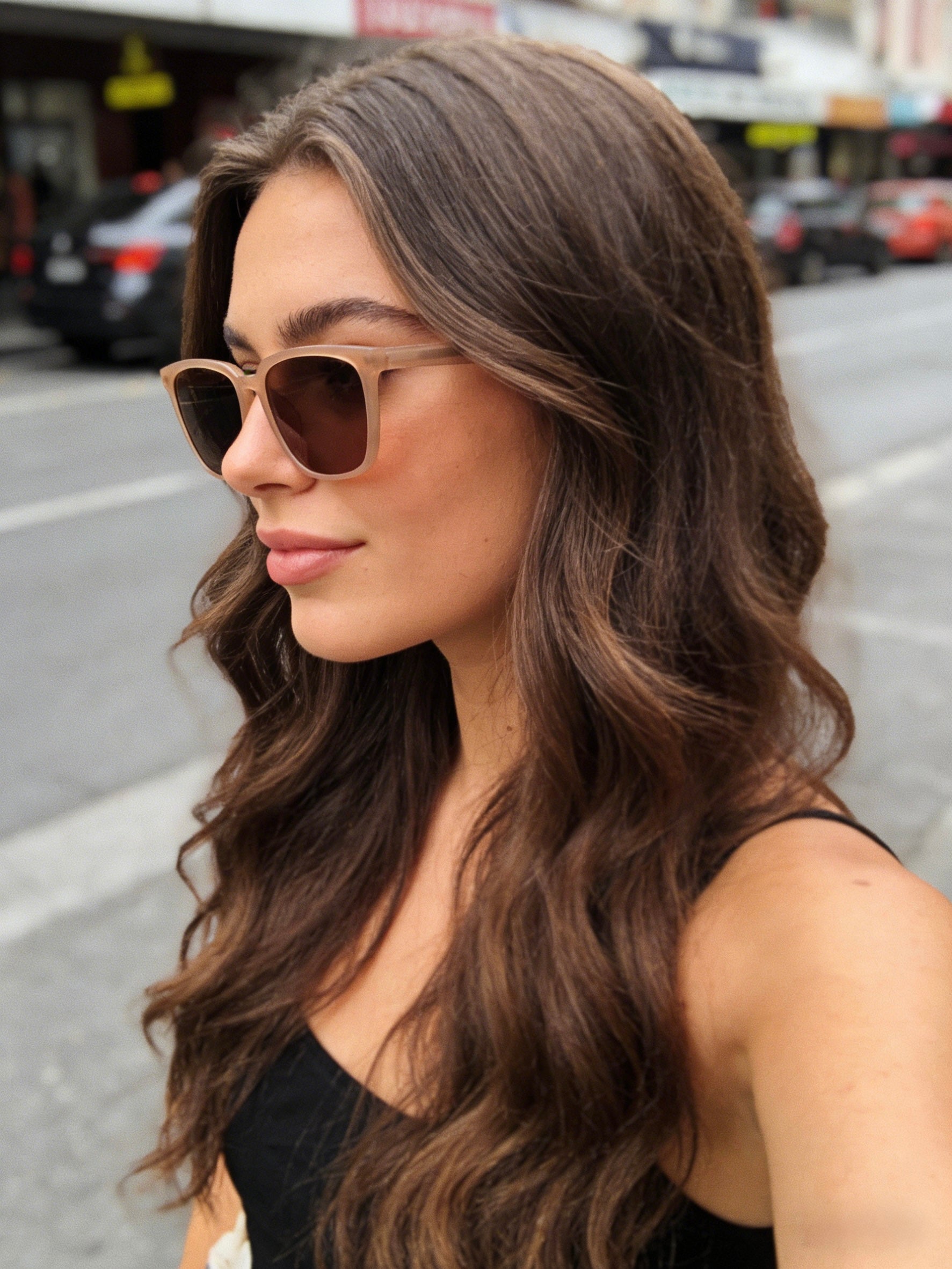 Pink Baby The Colton beige sunglasses with rounded frames and dark lenses, stylish eyewear for sun protection.
