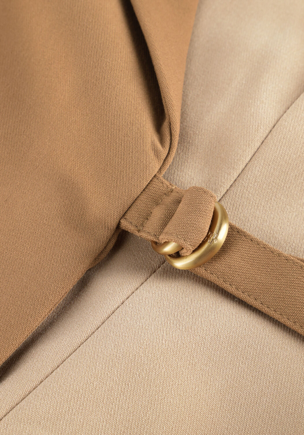 Pink Baby Layla two-tone camel blazer mini dress displayed on a hanger with detailed fabric texture and stylish design.