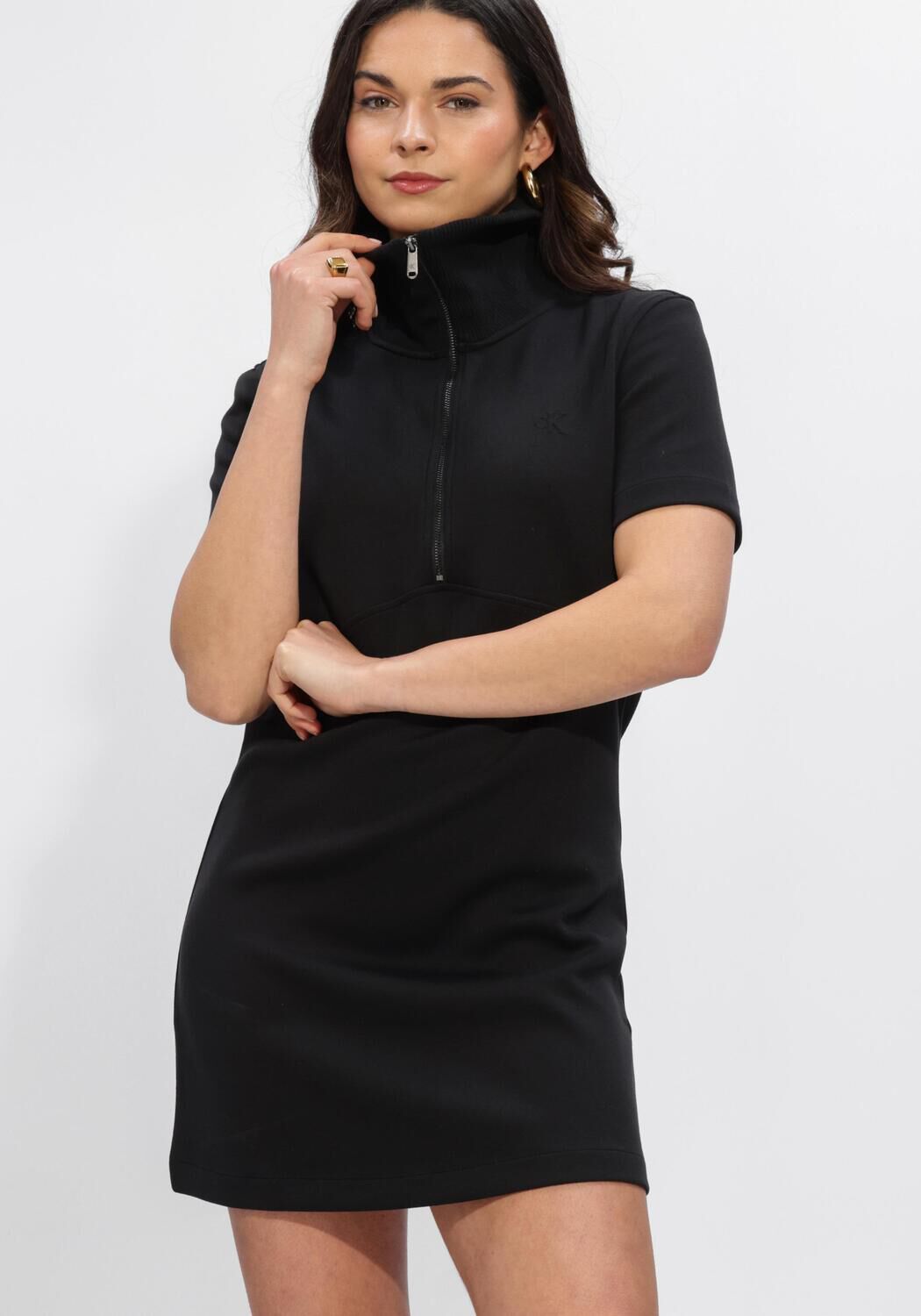 Black Bianca Zip-Collar Mini Dress by Pink Baby, featuring a fitted silhouette and stylish zip collar detail.