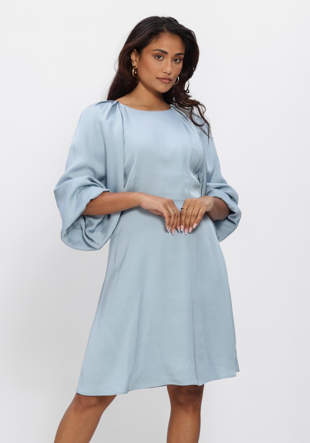 Pink Baby Evelina Draped Balloon-Sleeve Mini Dress in Dusty Blue, featuring a flowy silhouette and stylish balloon sleeves.