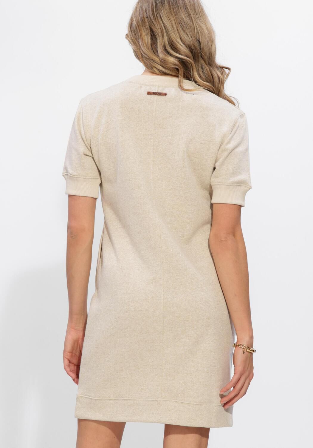 Pink Baby Elise oat beige knit mini dress with notch-neck design, fitted style, and long sleeves perfect for casual wear.