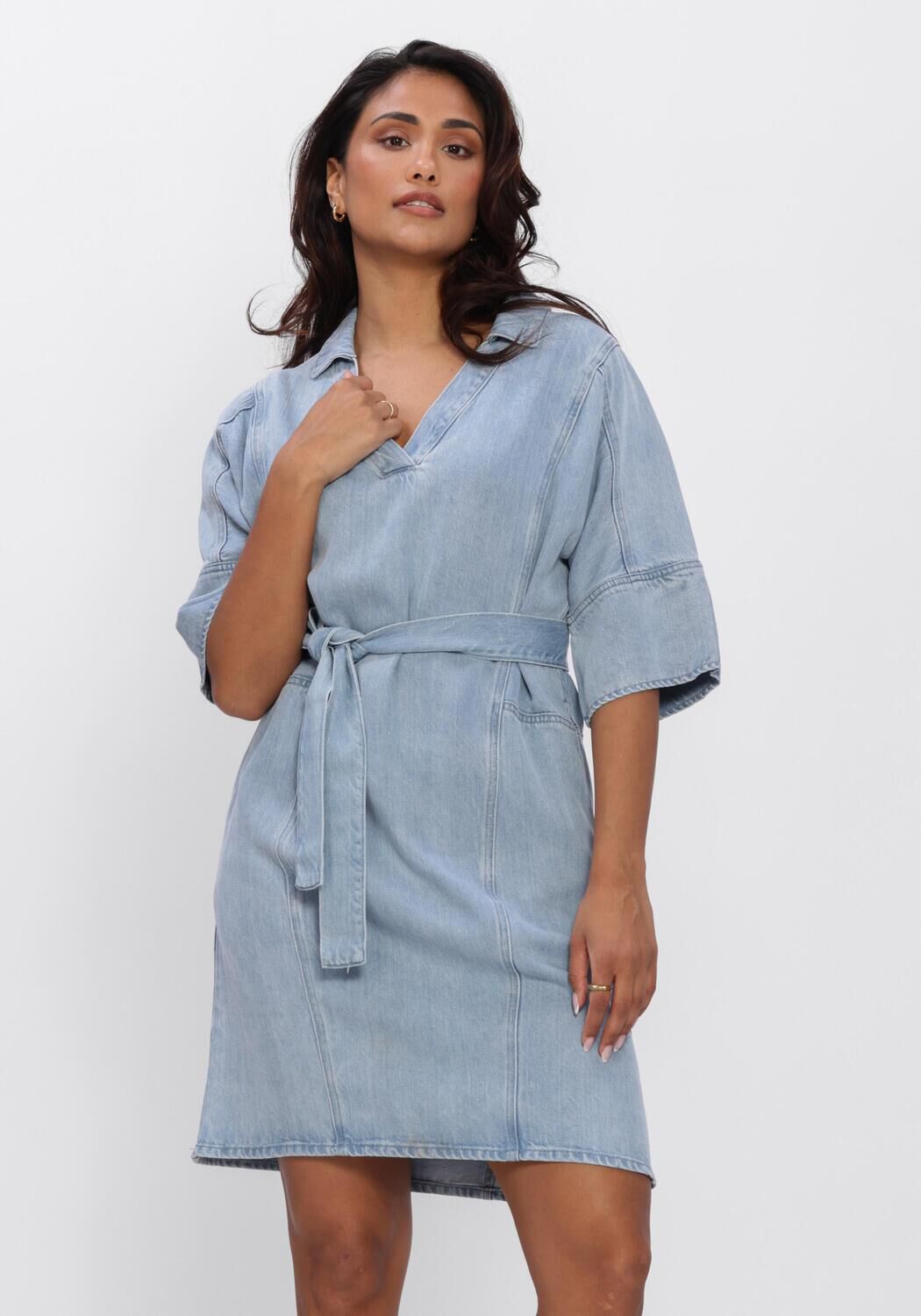 Light blue Dona belted denim mini dress by Pink Baby, featuring a classic denim design and stylish waist belt.