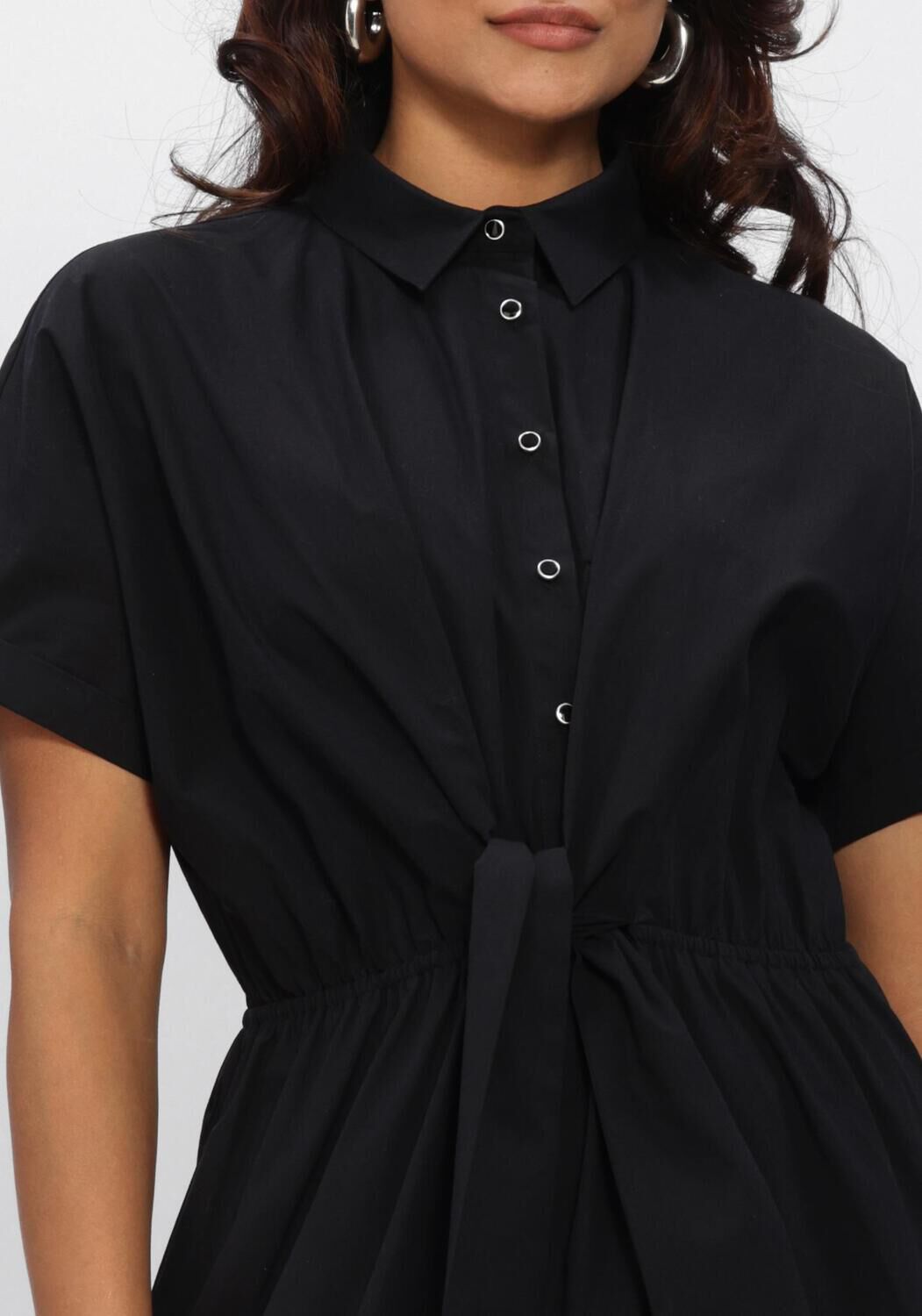 Black Celina tie-waist maxi dress by Pink Baby, featuring a flowy silhouette and stylish design, shown on a model.