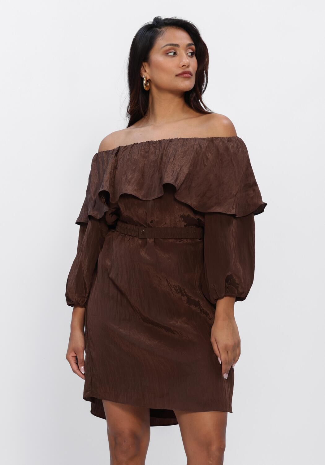 Chocolate brown Rosalyn off-shoulder ruffle mini dress by Pink Baby, featuring a stylish off-shoulder design and ruffle details.