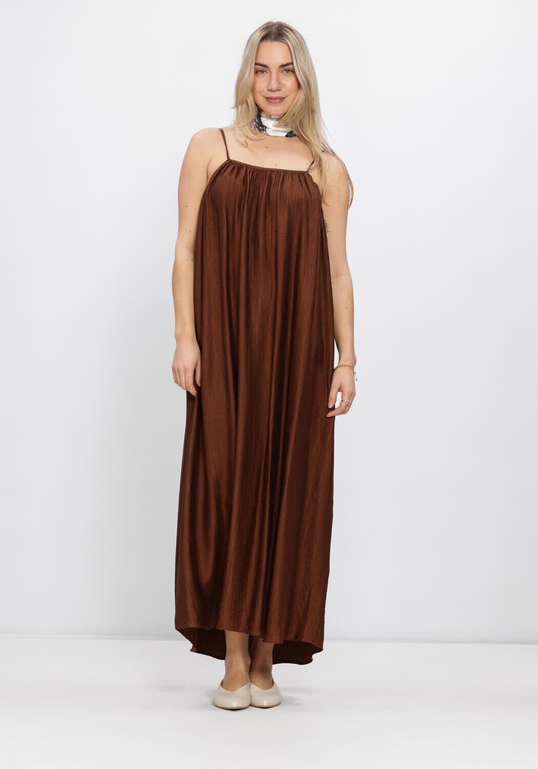 Pink Baby Sofia pleated satin maxi dress in chocolate brown, flowing design with pleats and elegant style.