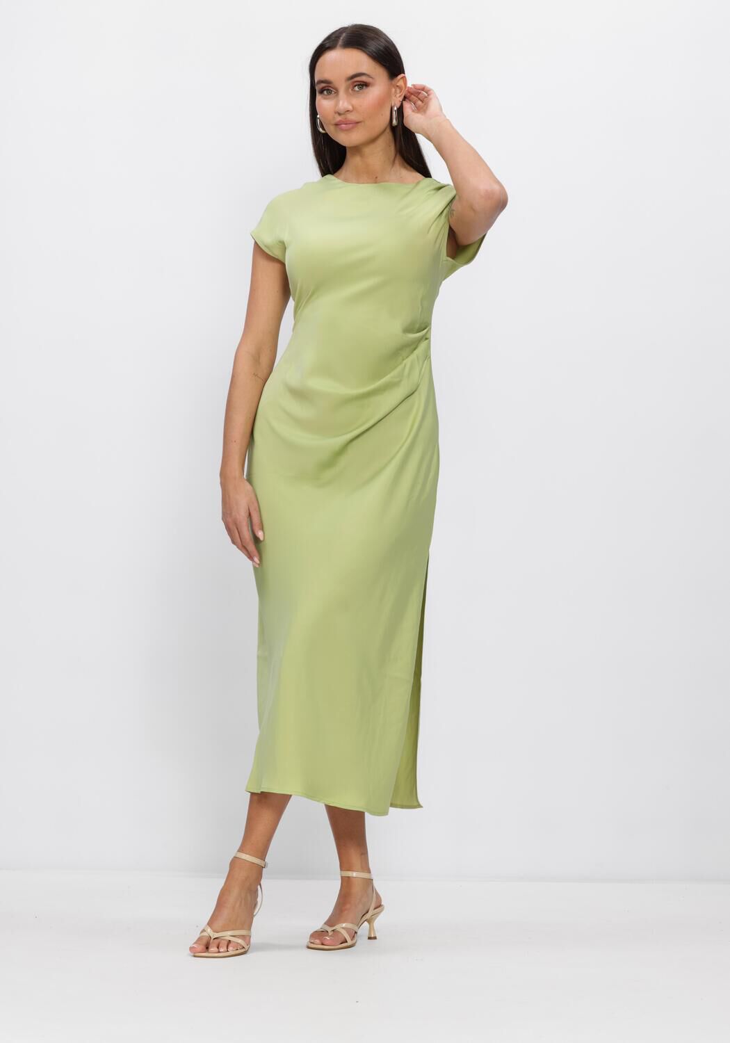 Pink Baby Amalia open-back satin midi dress in sage green, featuring a flowing design and elegant open-back detail.