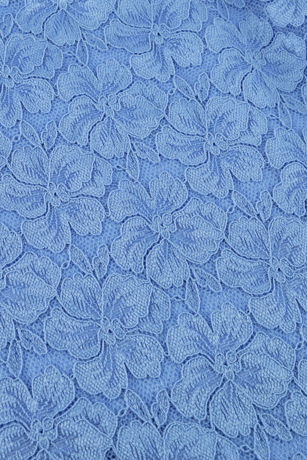 Pink Baby Mirabelle lace wrap mini dress in cornflower blue with delicate lace details, perfect for elegant occasions.