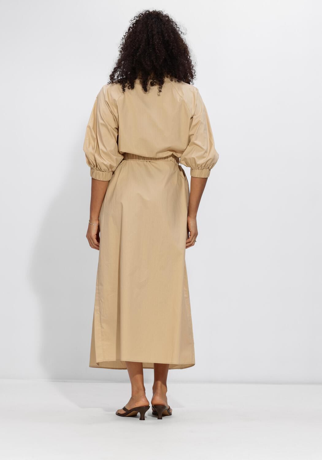 Pink Baby Sabine belted shirt maxi dress in sand beige, flowing fabric with a waist belt and button-down front.