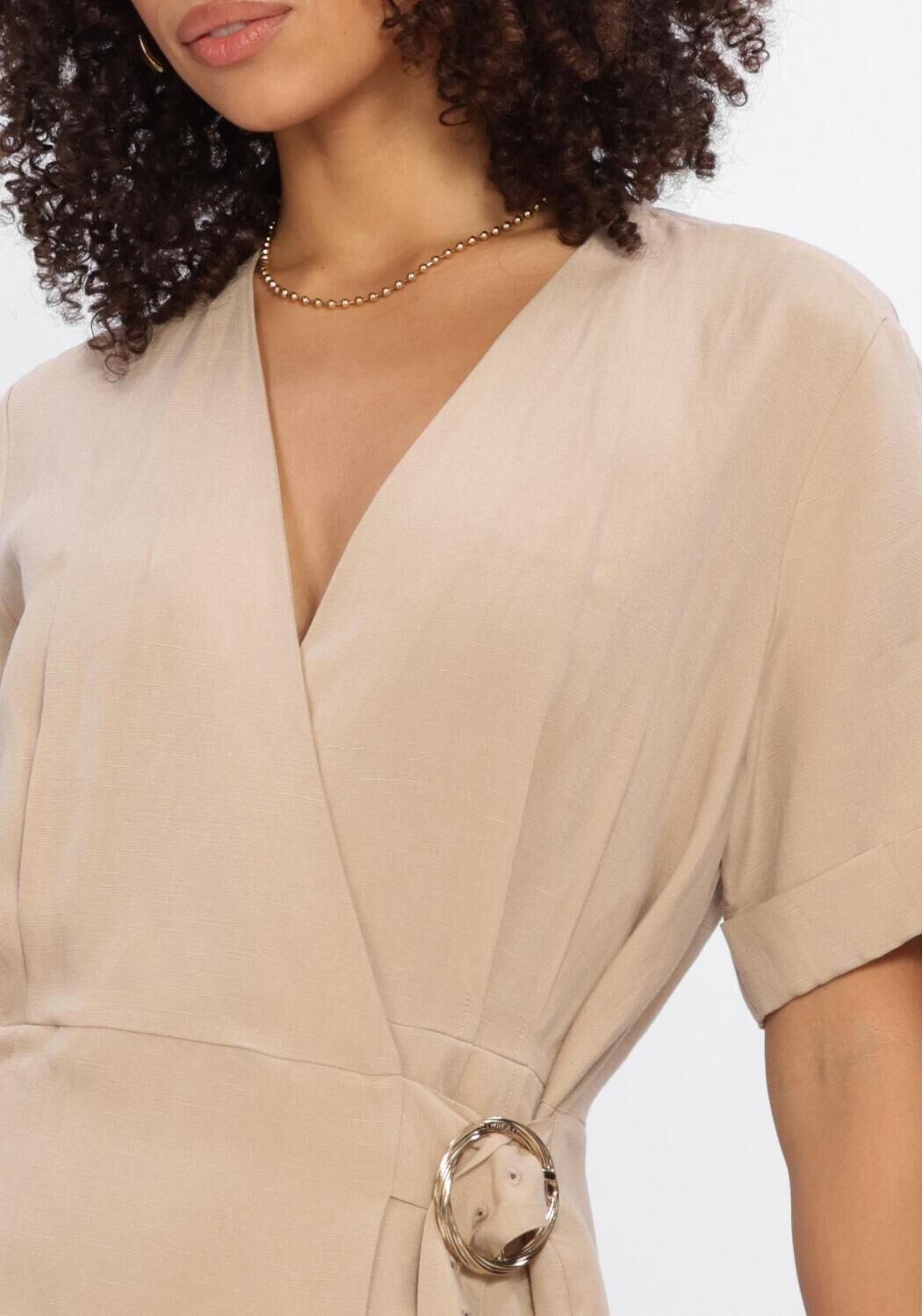 Pink Baby Camille Buckle Wrap Midi Dress in beige, featuring a stylish wrap design and buckle detail, perfect for elegant occasions.