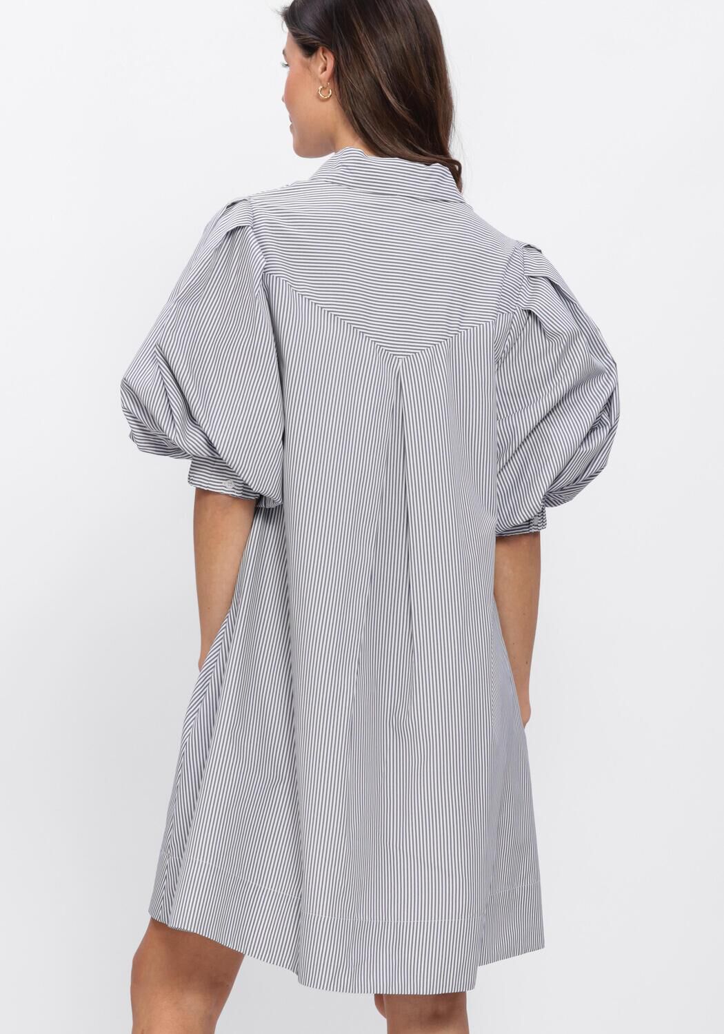 Pink Baby Adelina striped puff-sleeve shirt dress in white and black, featuring a stylish, casual design with puffed sleeves.