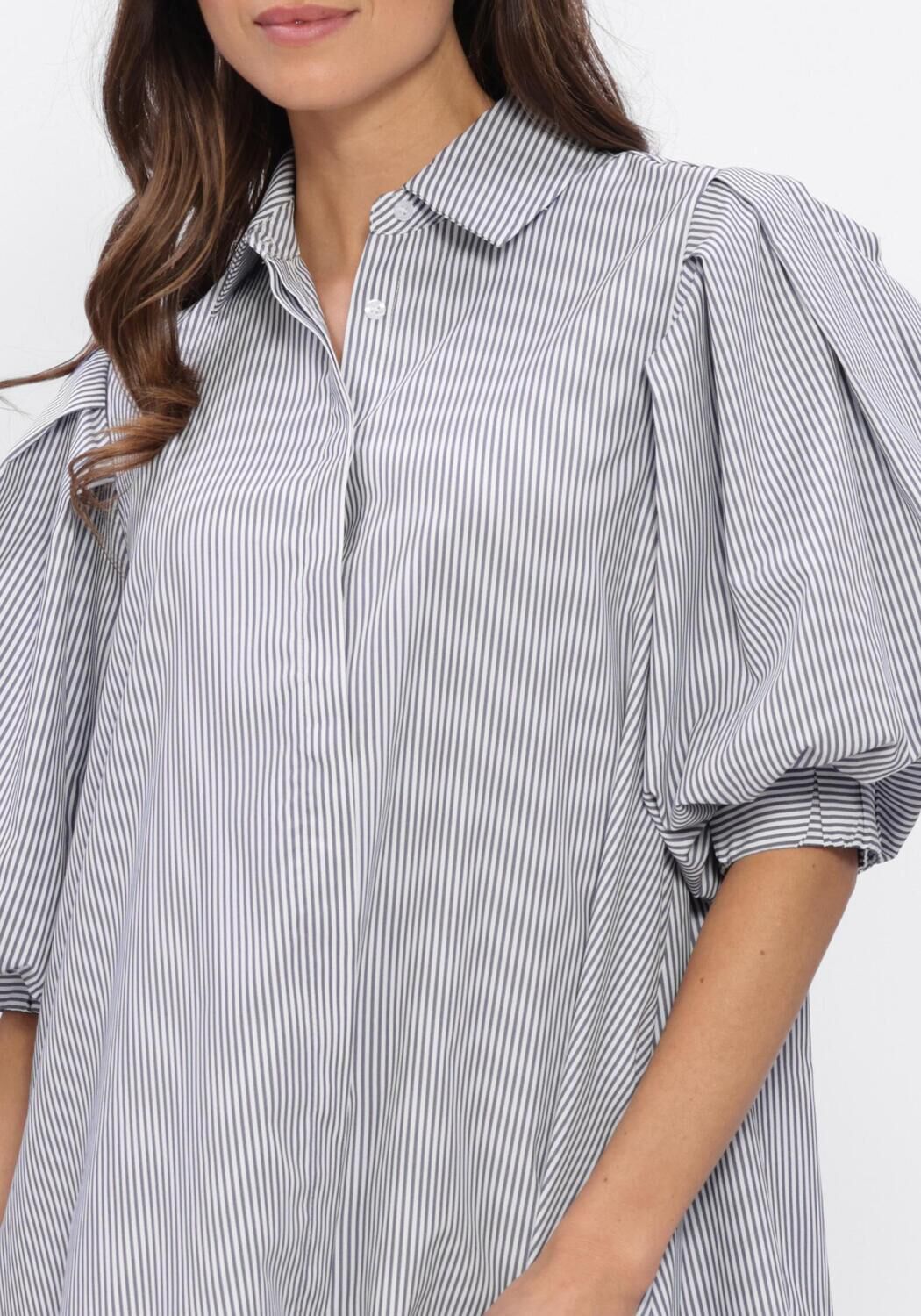 Pink Baby Adelina striped puff-sleeve shirt dress in white and black, featuring a fitted waist and stylish puff sleeves.