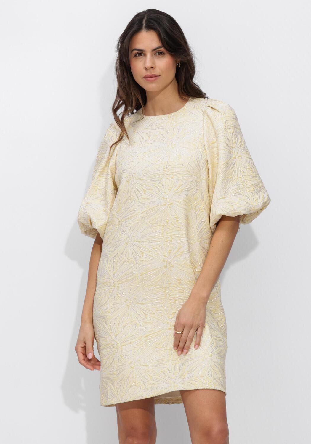 Pink Baby Sabelle textured puff sleeve mini dress in cream, featuring a stylish design and lightweight fabric.