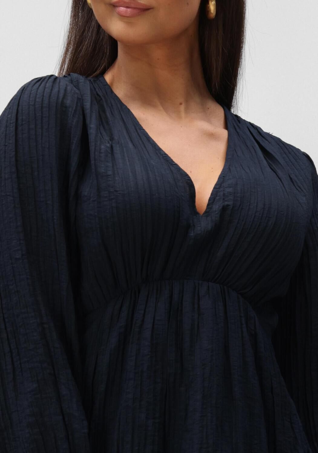 Pink Baby Serena textured V-neck maxi dress in midnight blue, flowing fabric and elegant design perfect for formal occasions.
