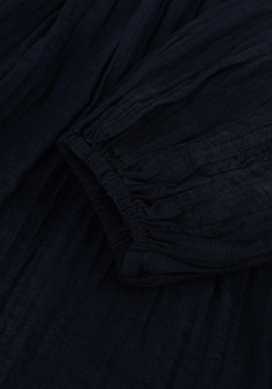 Pink Baby Serena textured V-neck maxi dress in midnight blue, flowing fabric, elegant design, and sleeveless silhouette.