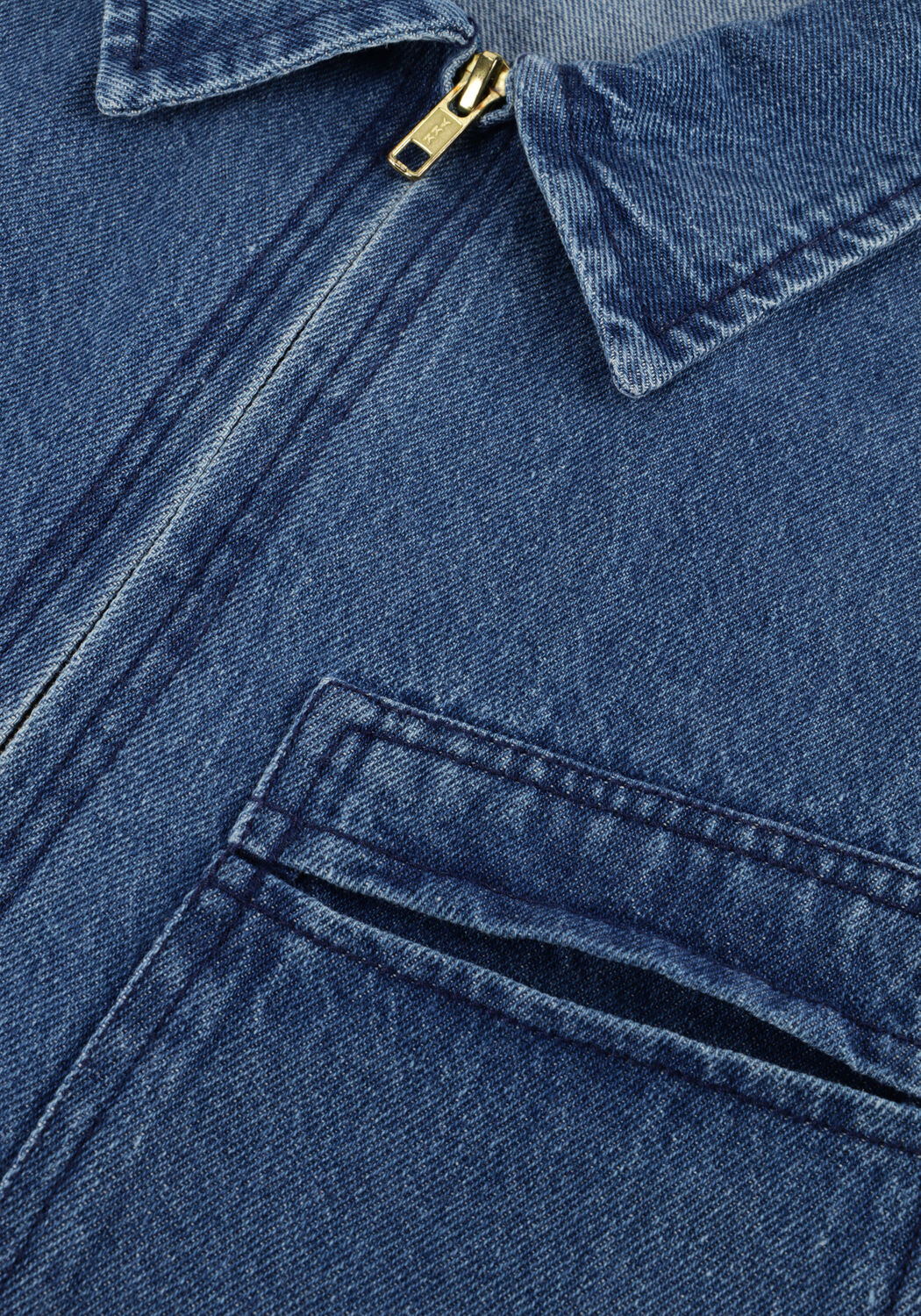 Pink Baby Senie zip-front denim mini dress in mid blue, featuring a fitted style and front zipper detail.
