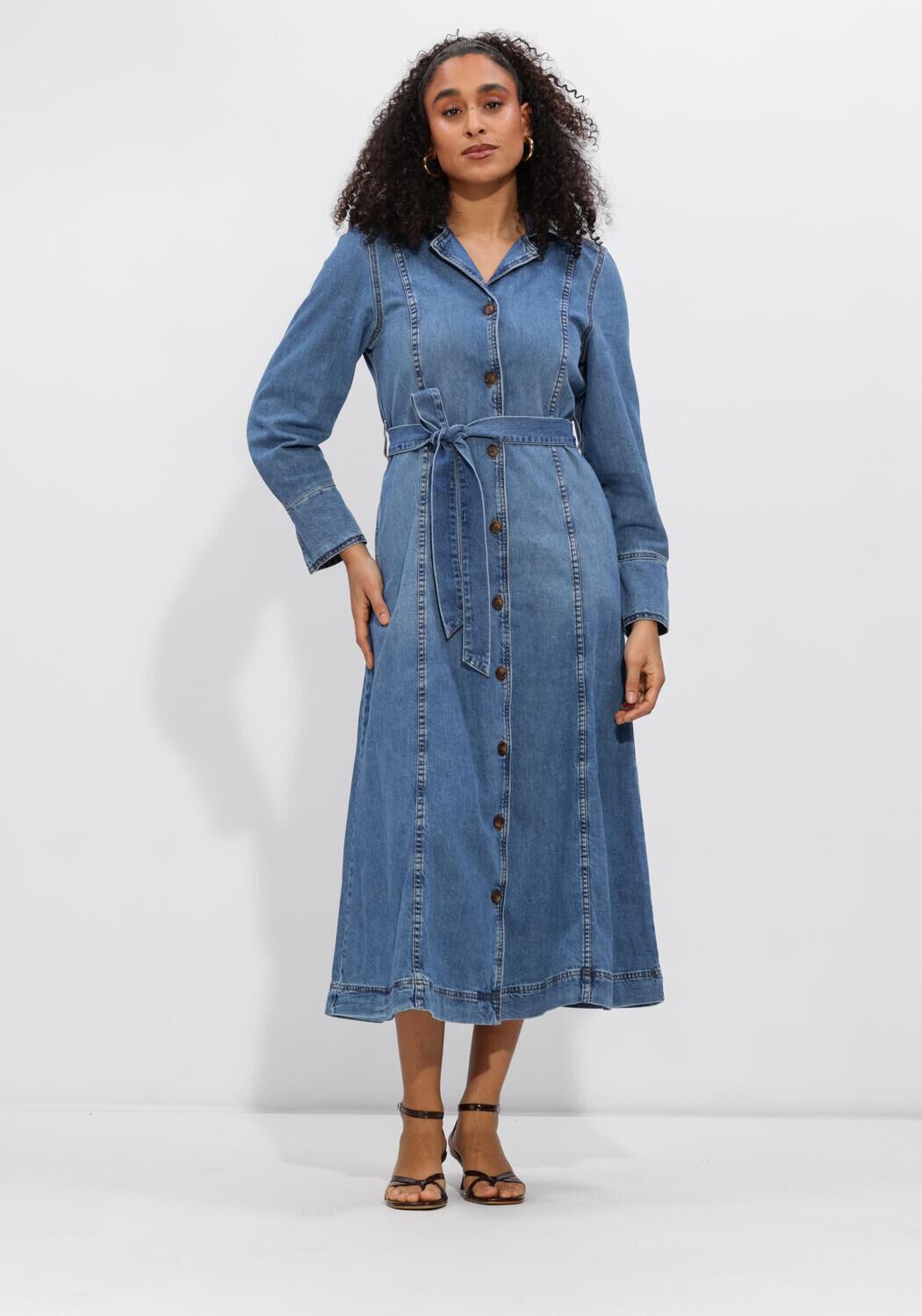 Pink Baby Caterina belted denim midi dress in mid blue, featuring a fitted waist and casual midi length for stylish comfort.