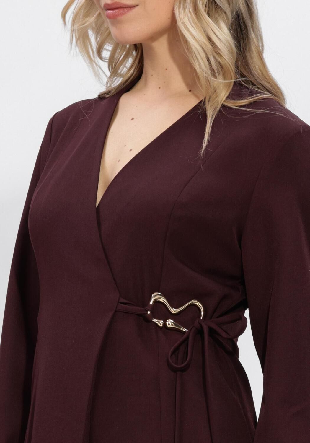 Pink Baby Viviana hardware wrap mini dress in burgundy, featuring a stylish design and fitted silhouette.