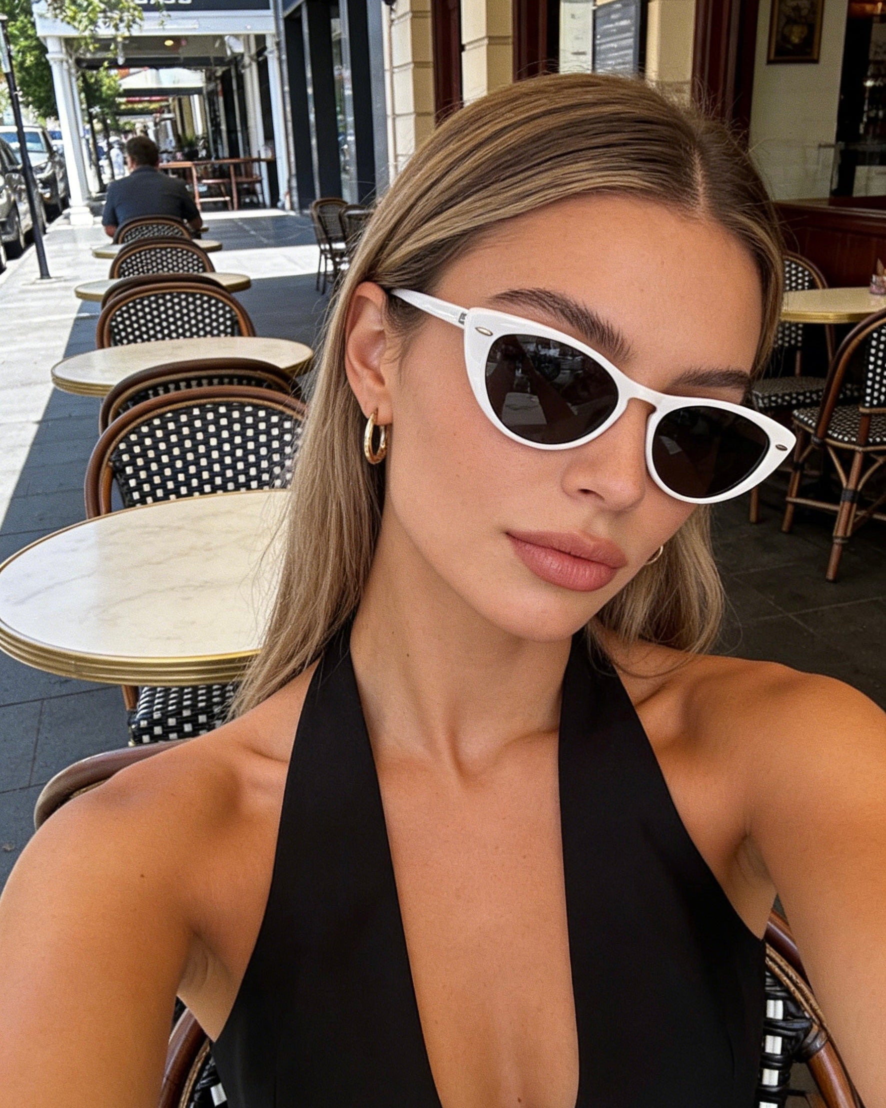 Pink Baby The Bailey white sunglasses with round frames and tinted lenses, stylish eyewear for women.