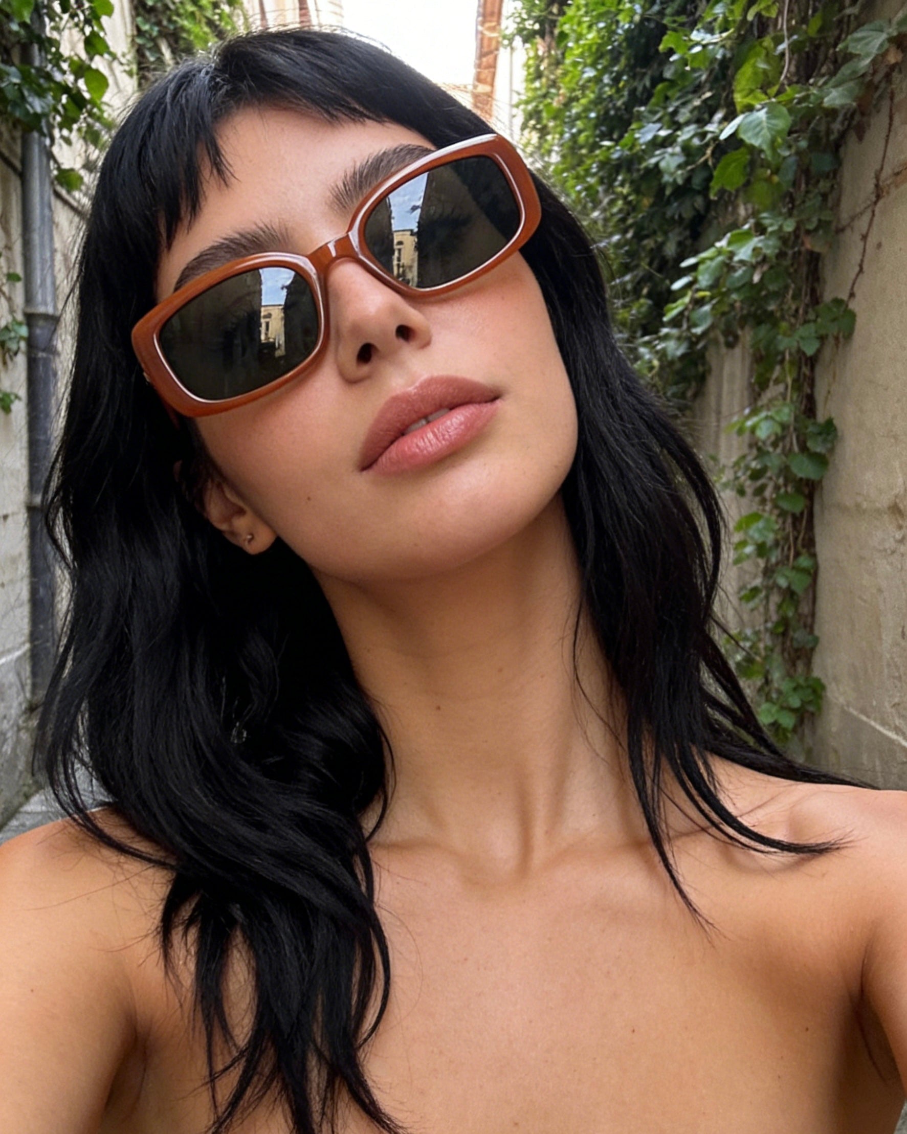 Pink Baby The Fern caramel sunglasses with round frames and dark tinted lenses, stylish and UV-protective eyewear.