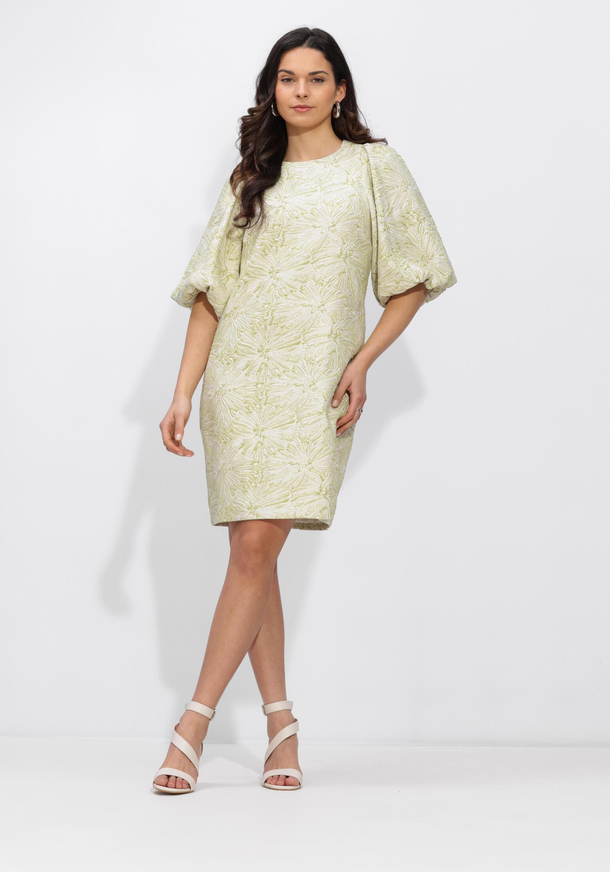 Pink Baby Cecilia textured puff sleeve mini dress in sage green, featuring a stylish and feminine design.