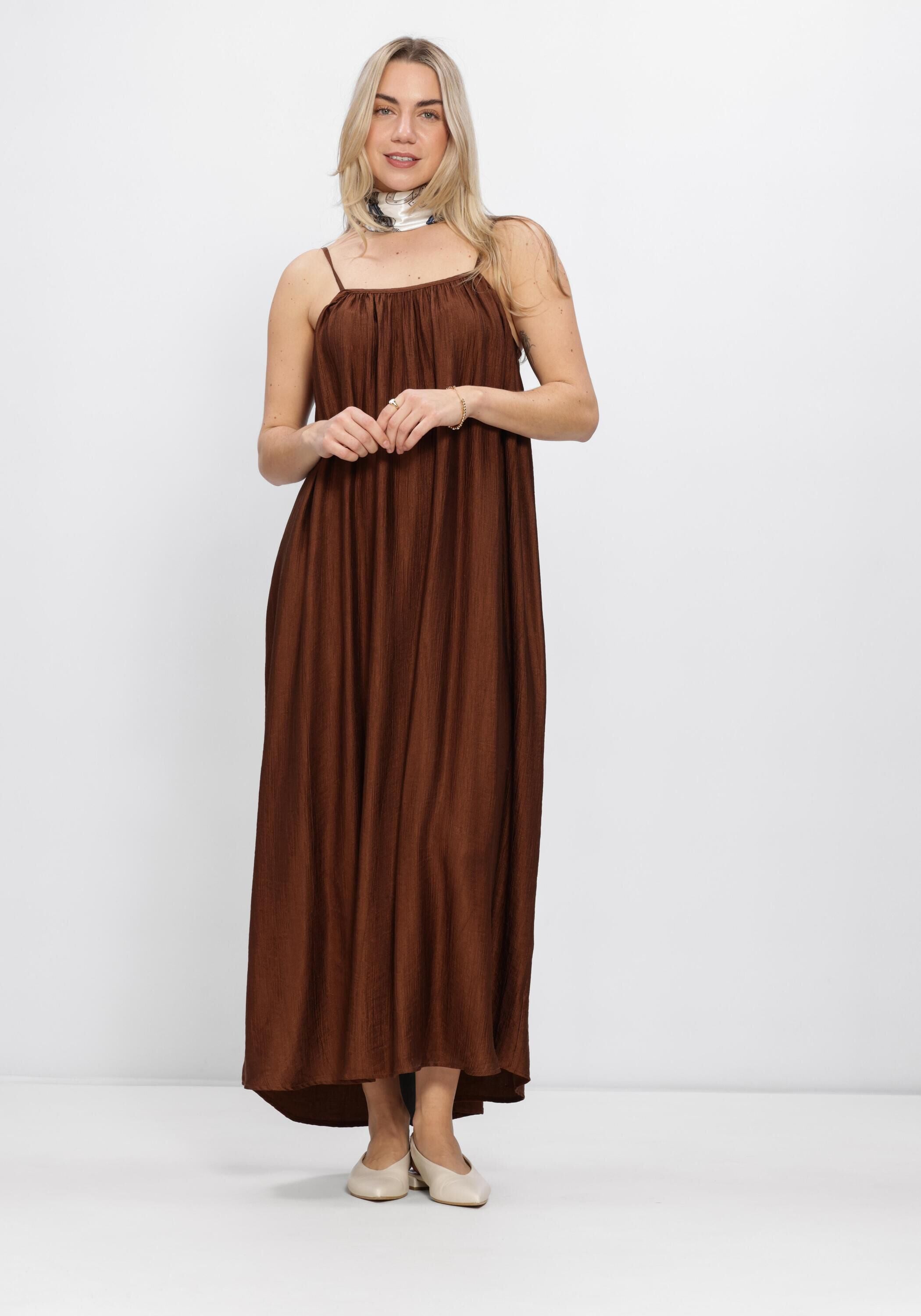 Pink Baby Sofia pleated satin maxi dress in rich chocolate brown, featuring elegant pleats and flowing fabric.