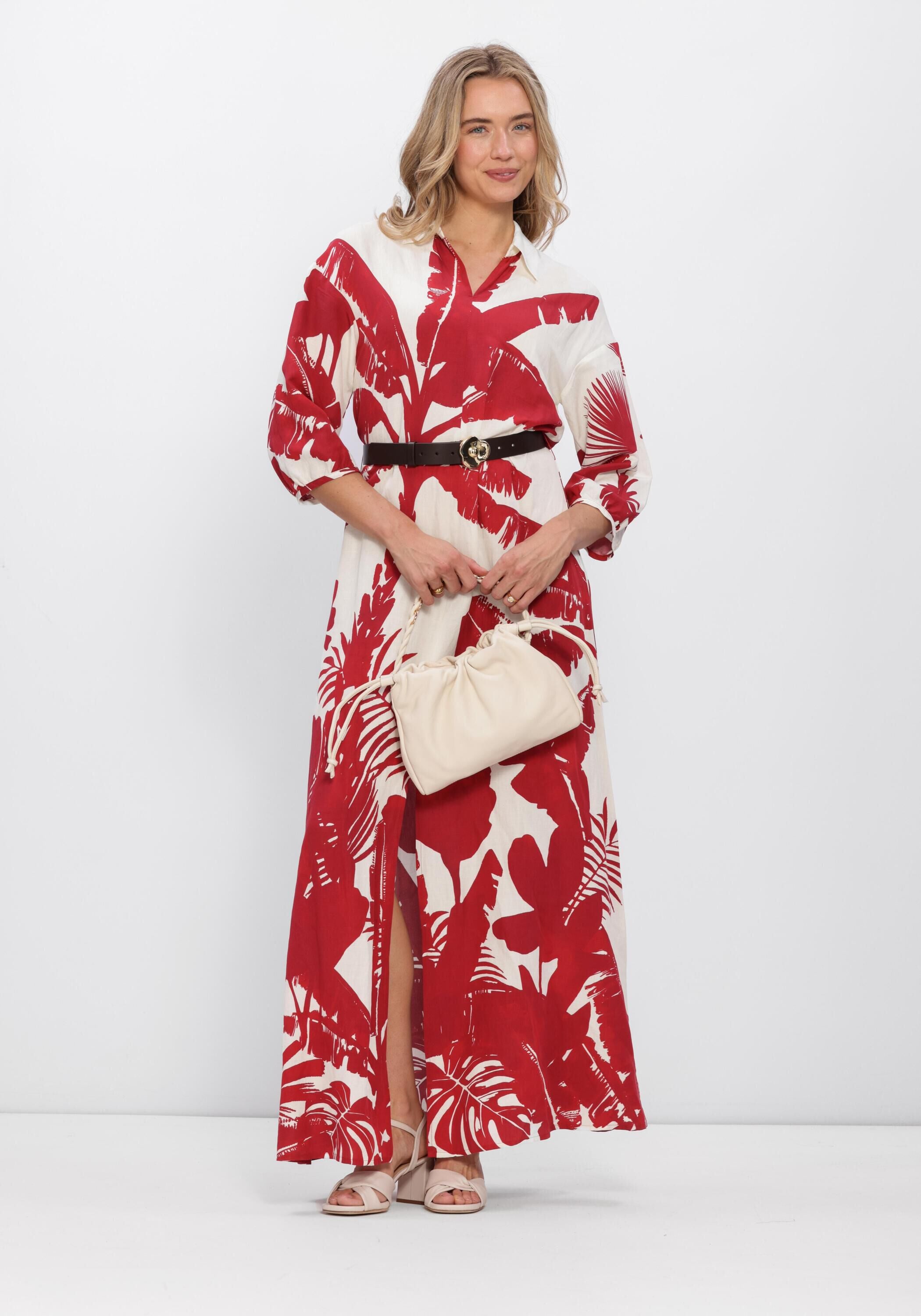 Pink Baby Marcia Tropical Print Maxi Dress in red and white, featuring a flowing design and vibrant tropical pattern.