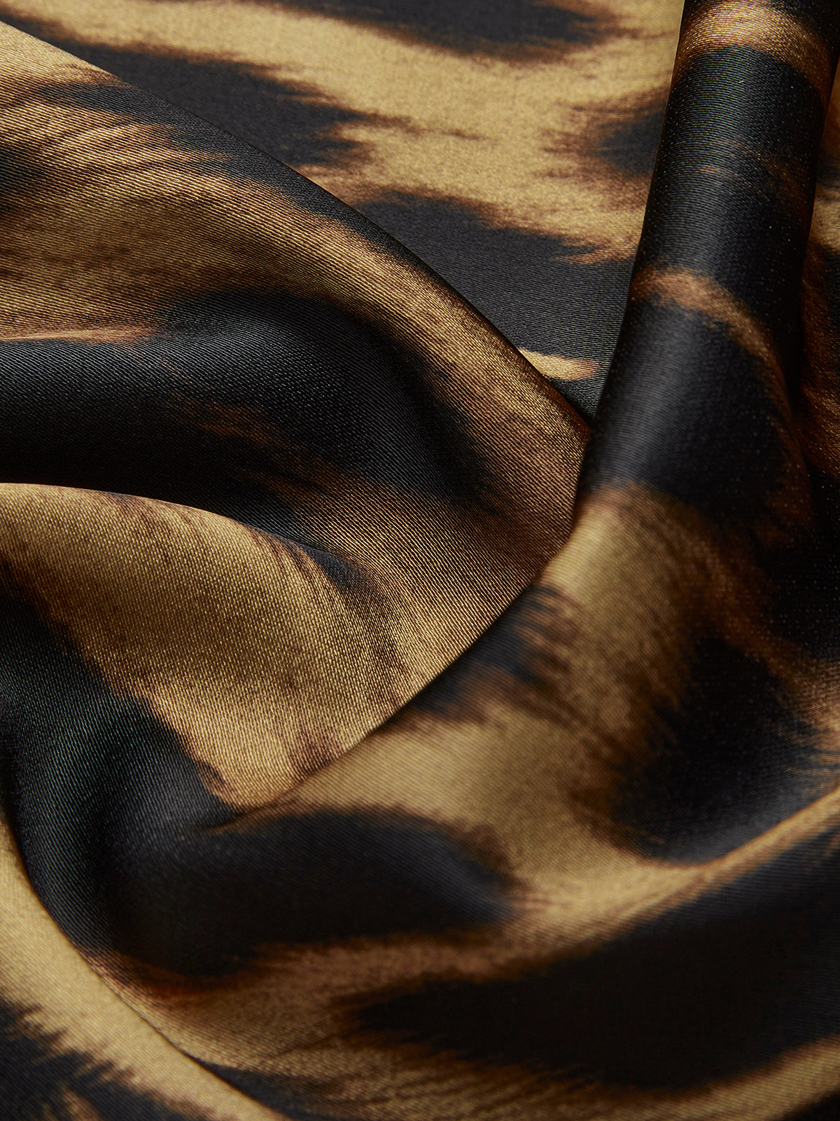 Pink Baby slim leopard print maxi skirt with a flowing silhouette, featuring bold animal print fabric for stylish summer wear.