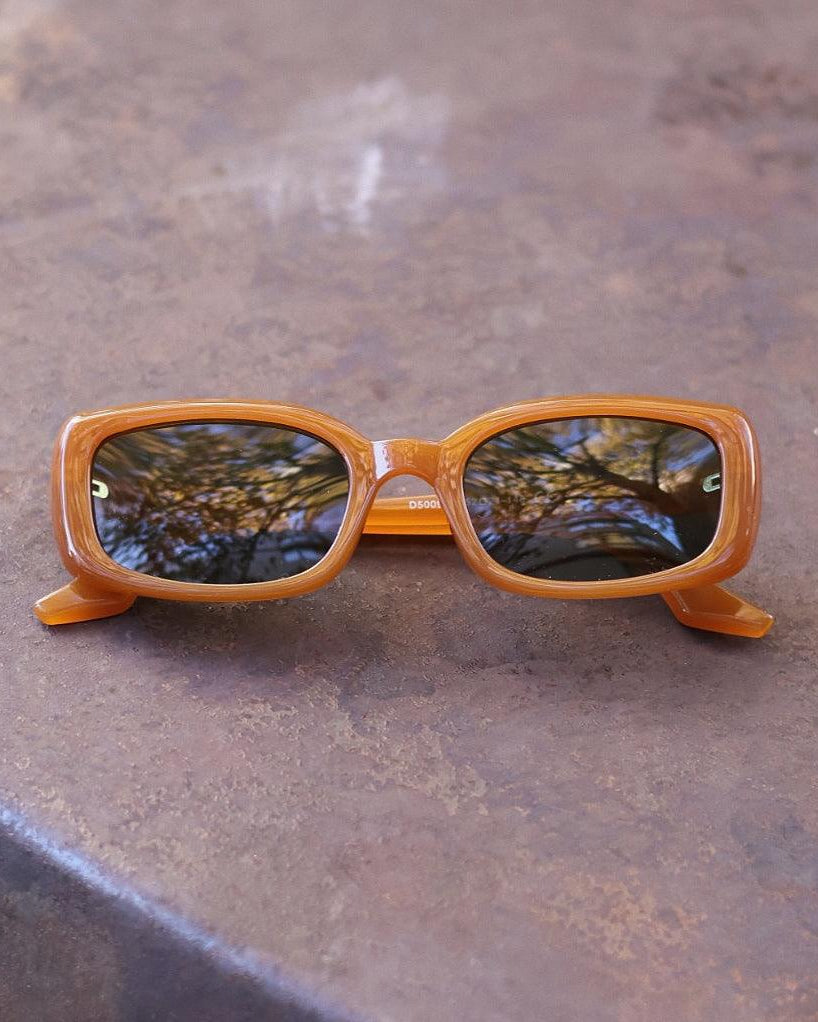 Pink Baby The Fern caramel sunglasses with round frames and tinted lenses, stylish and lightweight for casual wear.