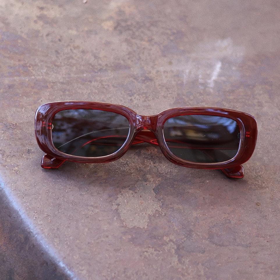 Pink Baby The Esme sunglasses with round frames and tinted lenses, stylish eyewear for a trendy look.