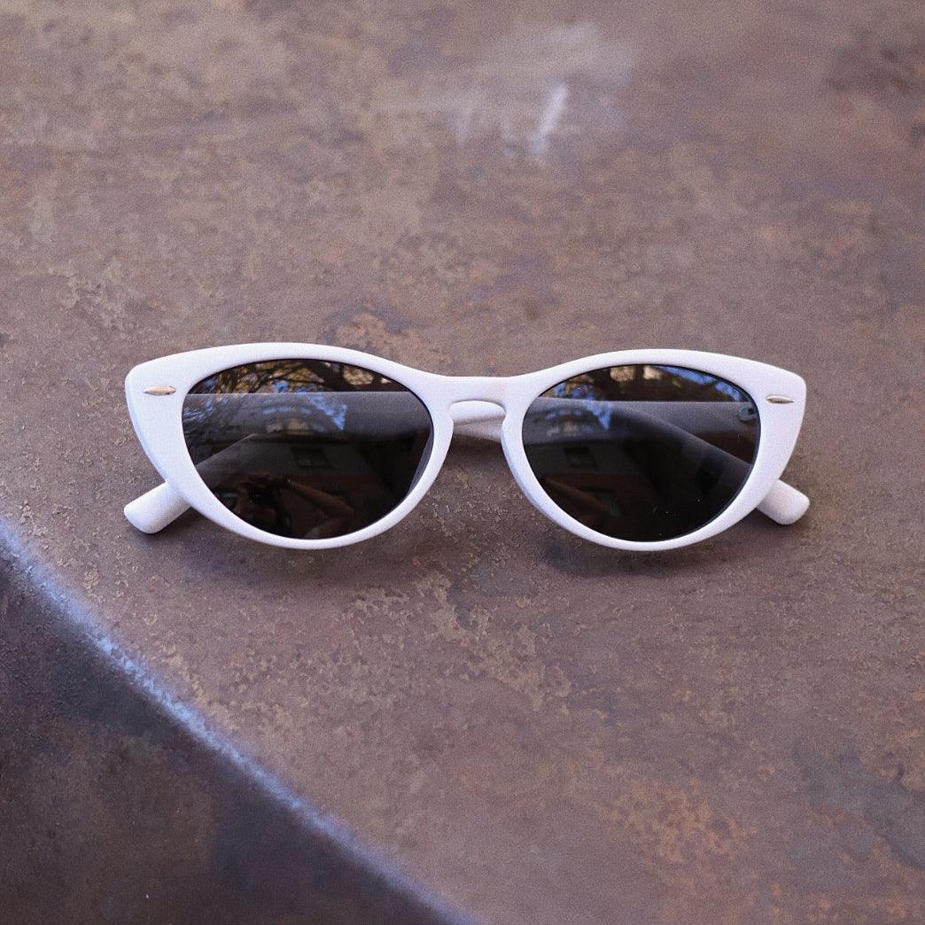 Pink Baby The Bailey white sunglasses with round frames and tinted lenses, stylish and protective for sunwear.