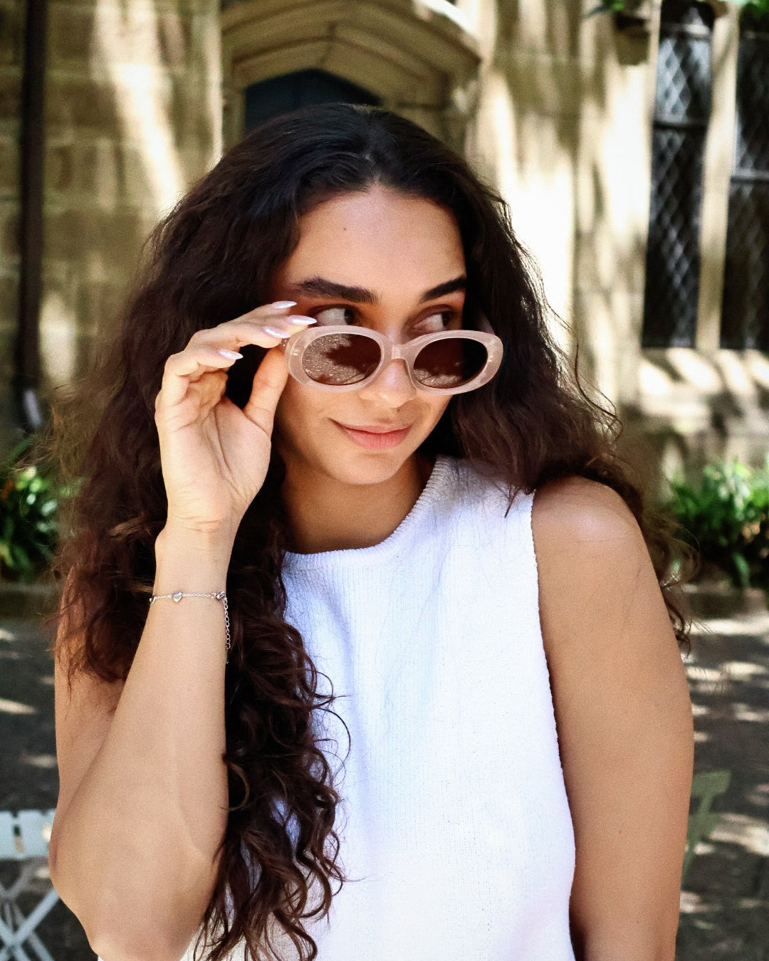 Pink Baby Flynn sunglasses in pink with rounded frames, showcasing stylish and protective eyewear for kids.