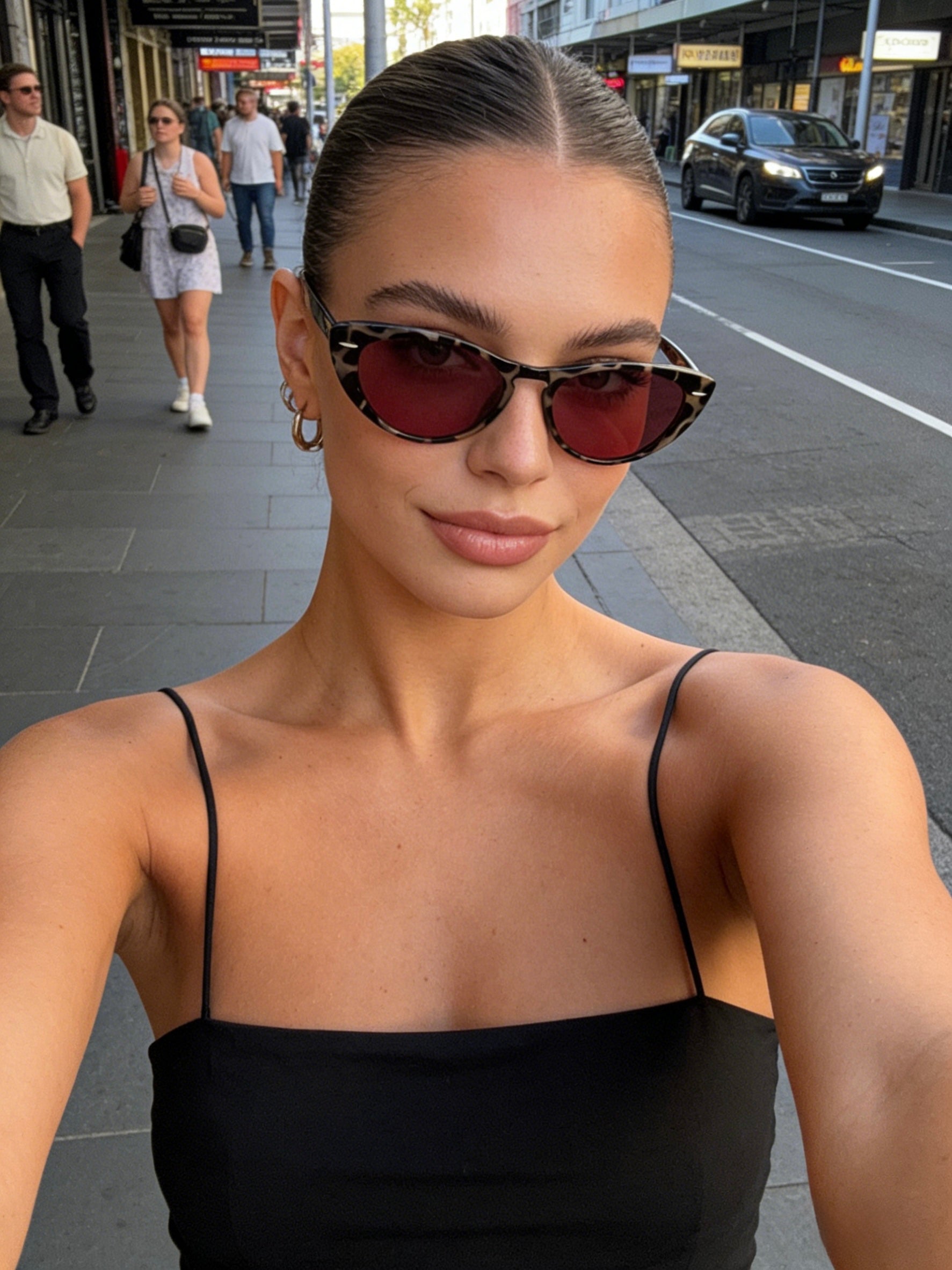 Pink Baby The Bailey tort sunglasses with stylish frame and dark lenses, designed for a trendy and fashionable look.