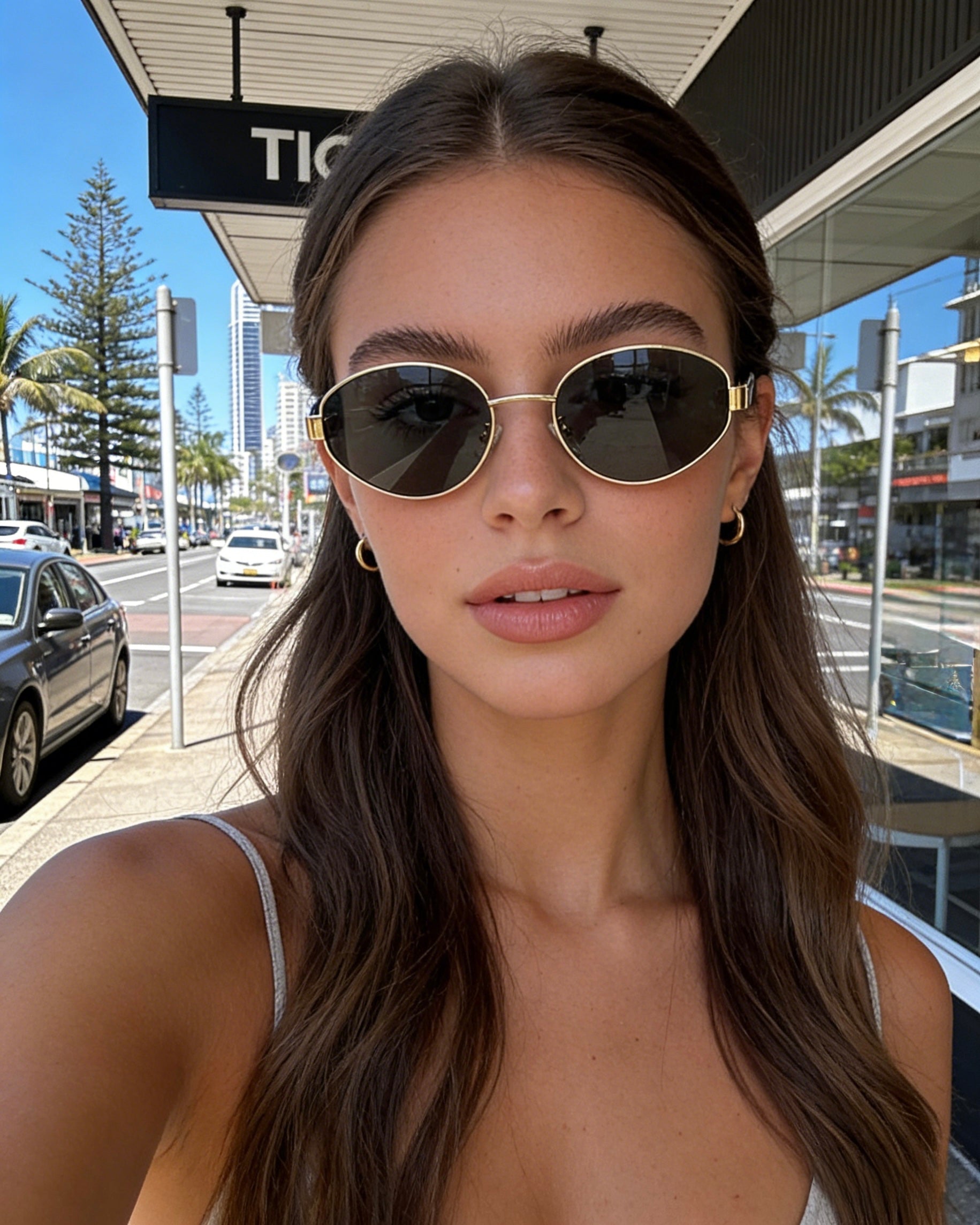 Pink Baby Hollis sunglasses in black with sleek frame and tinted lenses, stylish eyewear for sun protection.