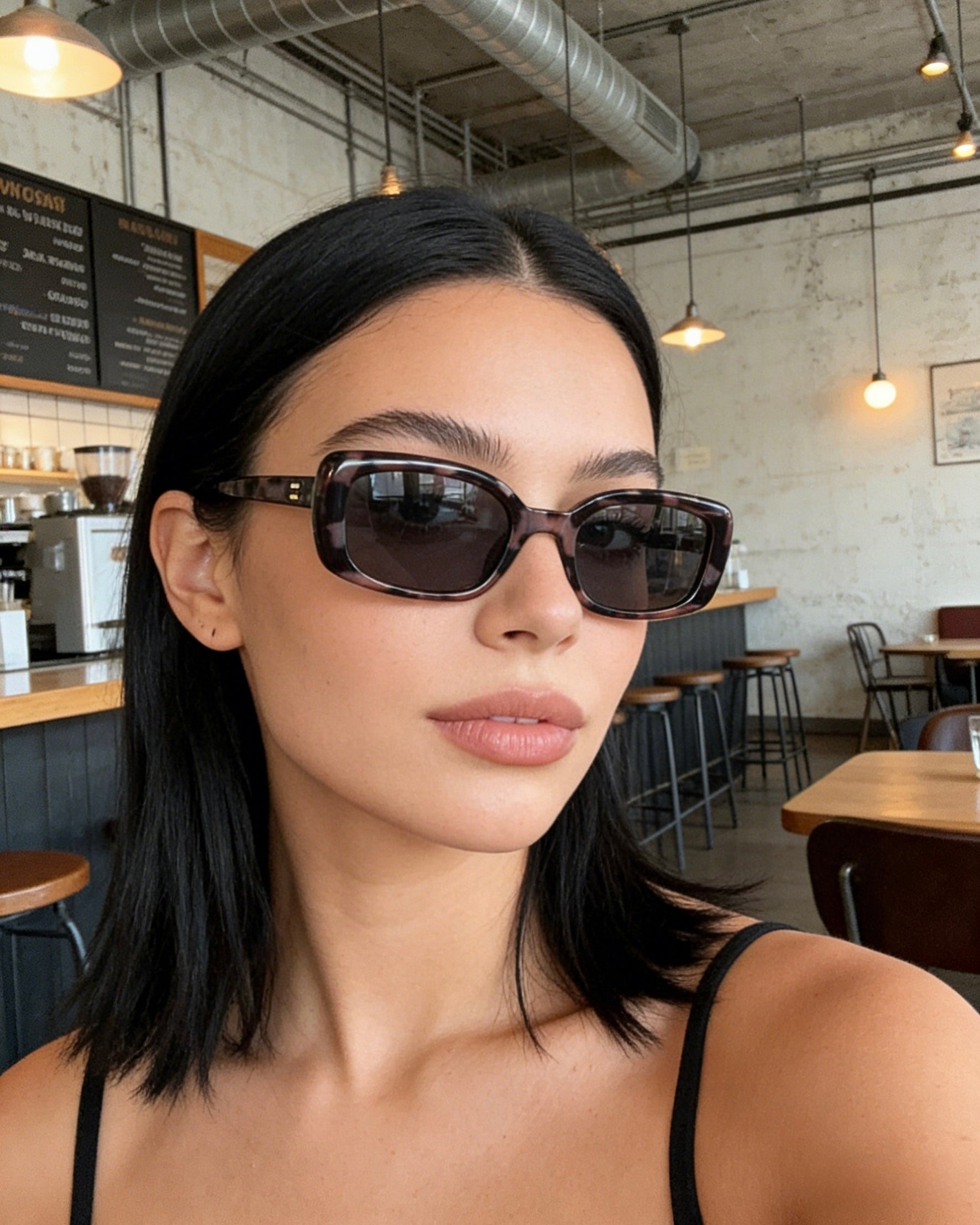 Pink Baby The Fern grey tort sunglasses with round frames and dark lenses, stylish eyewear for sun protection.