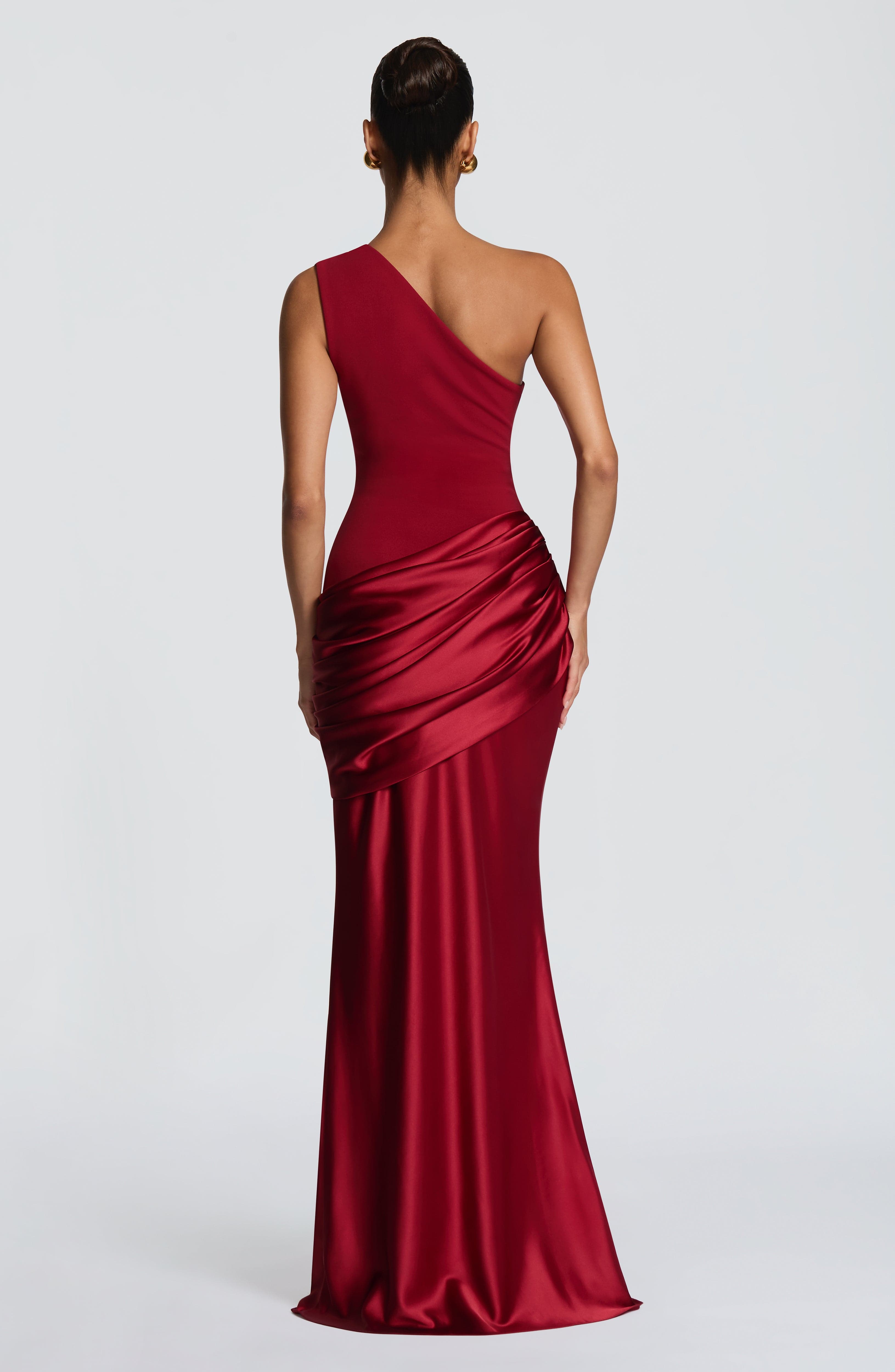 Pink Baby Sadona Maxi Dress in deep red, flowing fabric with a stylish design, perfect for elegant occasions.