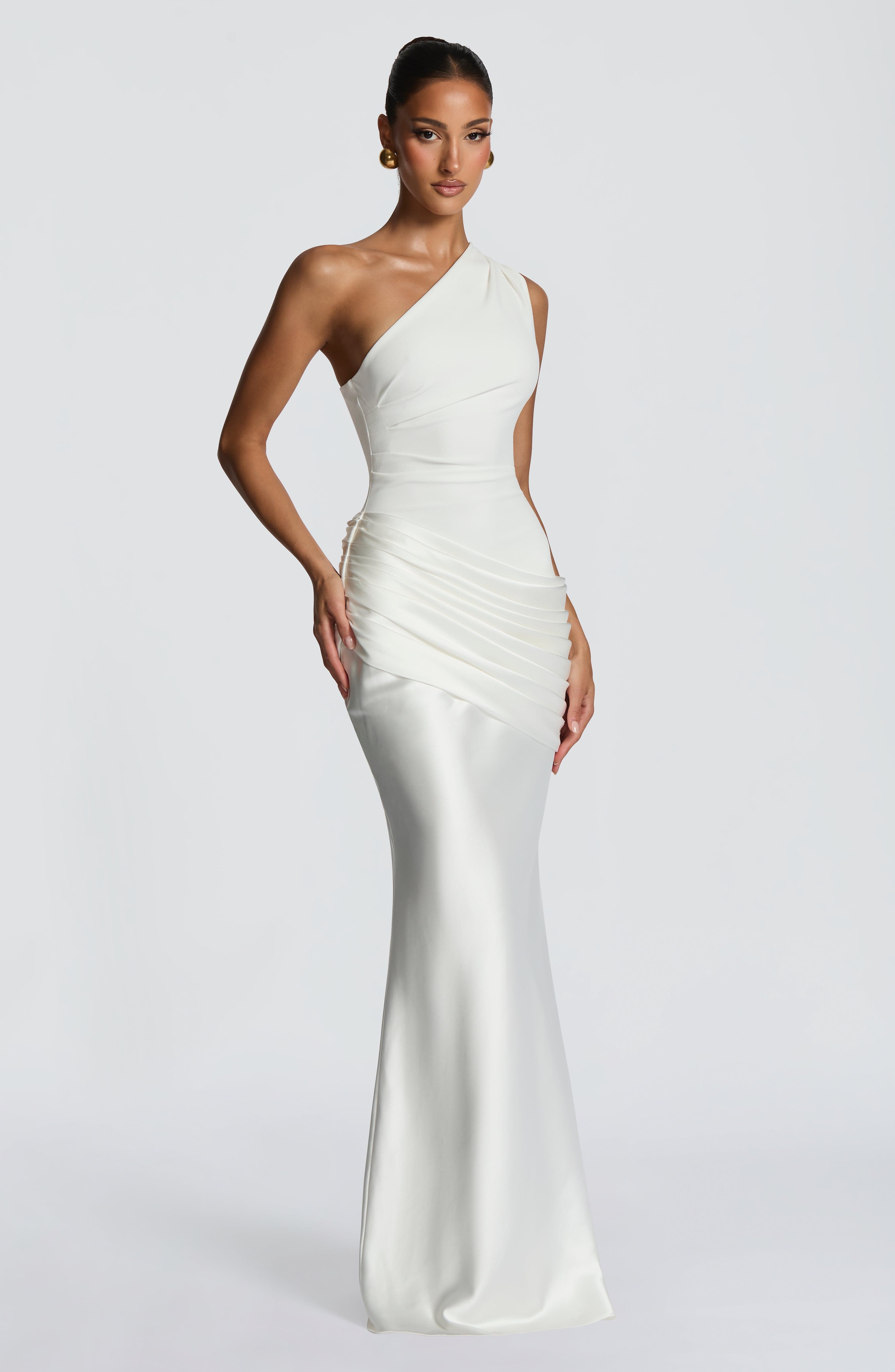 Ivory Sadona Maxi Dress by Pink Baby, flowing fabric with elegant design, perfect for special occasions or summer wear.