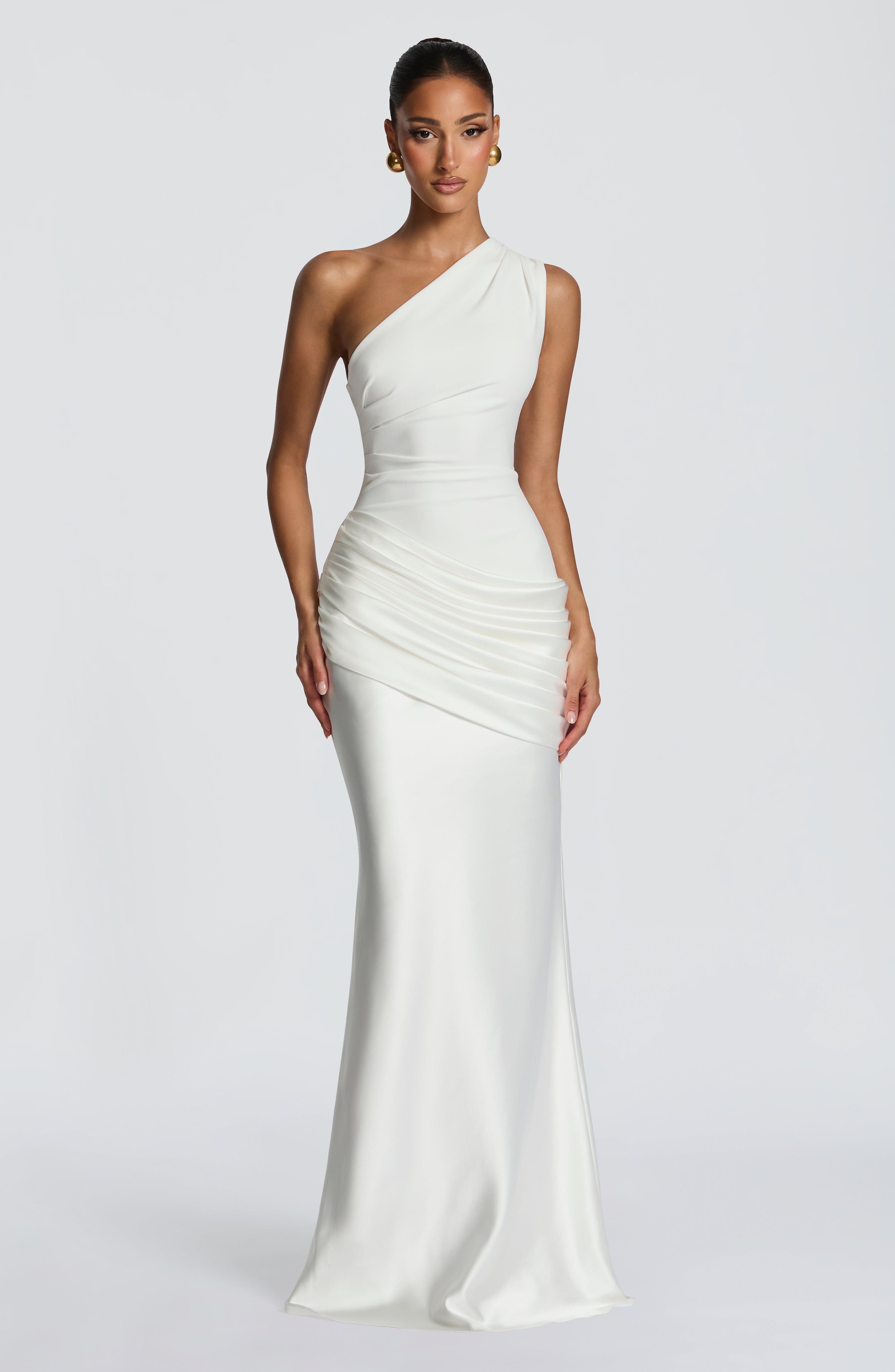 Ivory Sadona Maxi Dress by Pink Baby featuring a flowing silhouette and sleeveless design, perfect for elegant summer occasions.