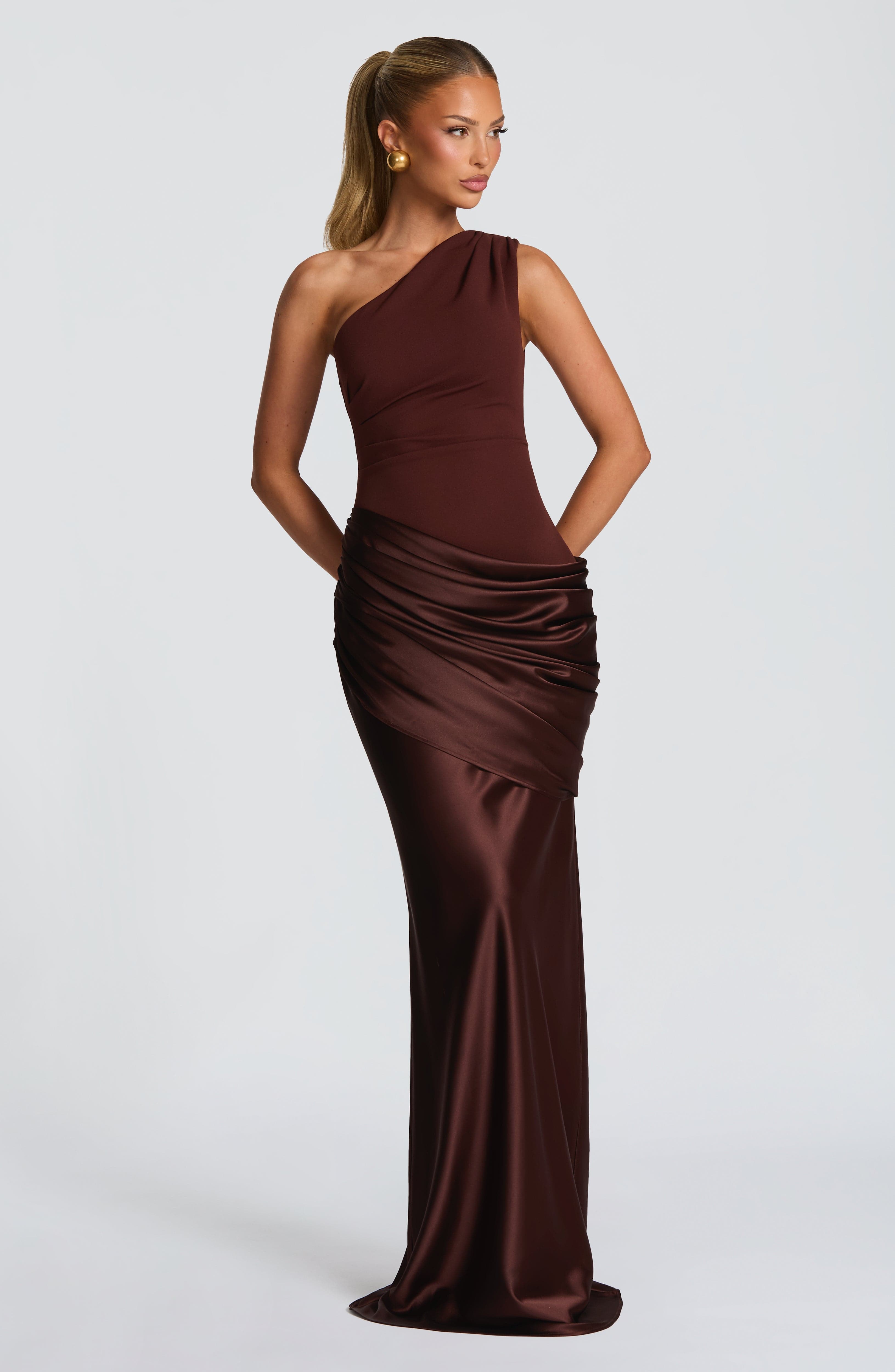 Pink Baby Sadona Maxi Dress in Plum Brown, flowing fabric with elegant design, perfect for stylish occasions.
