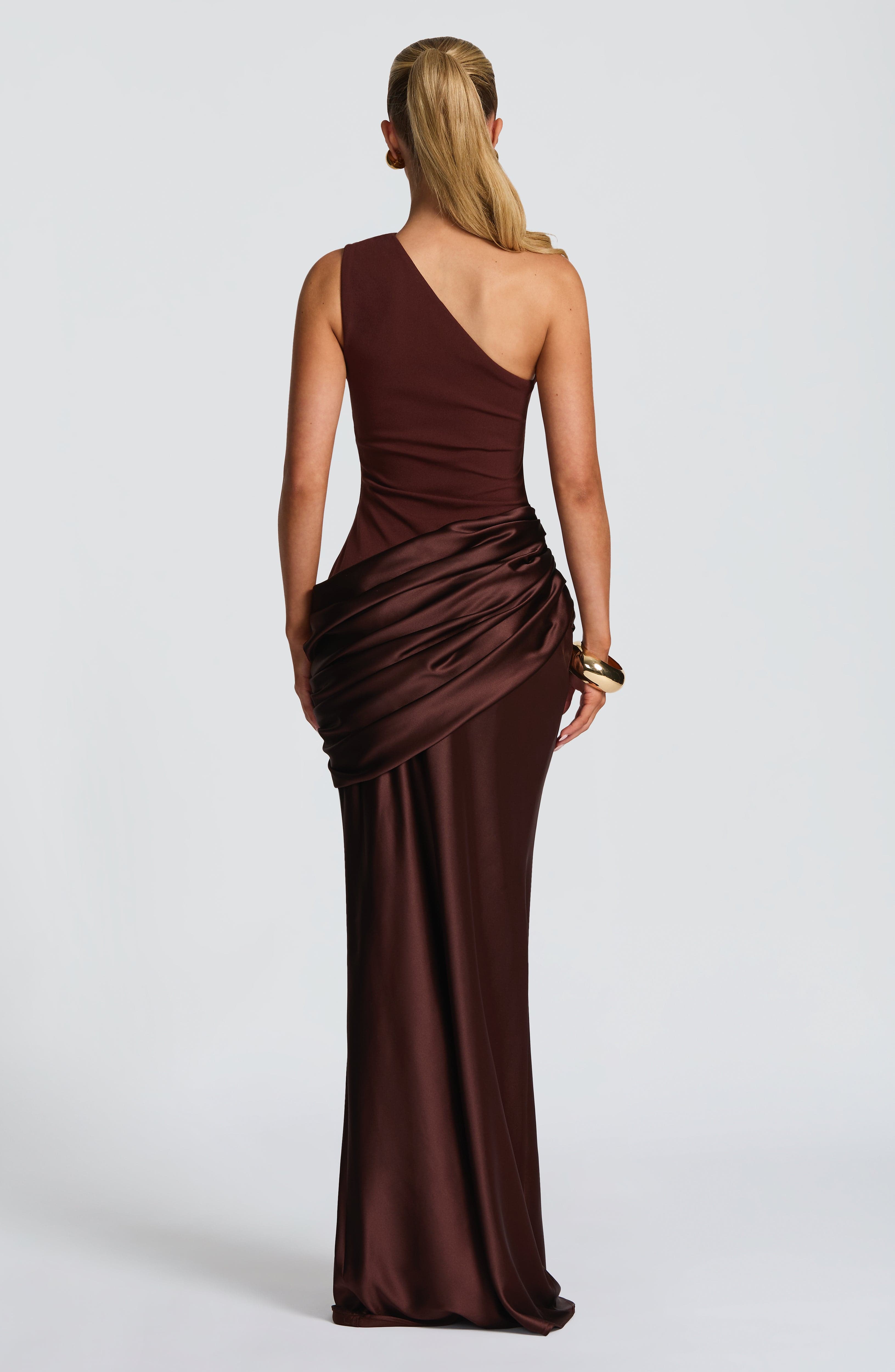 Pink Baby Sadona Maxi Dress in plum brown, featuring a flowing design and elegant style, perfect for special occasions.