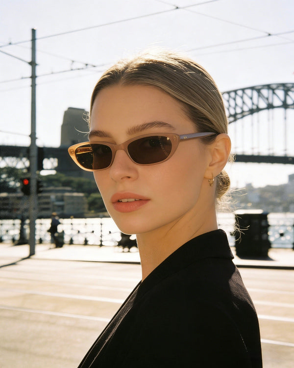 Pink Baby The Indie cinnamon sunglasses with round frames and tinted lenses, stylish and trendy eyewear for casual wear.