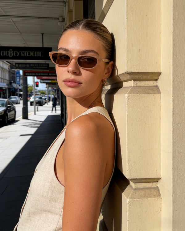 Pink Baby The Indie cinnamon sunglasses with round frames and tinted lenses, stylish and protective for everyday wear.