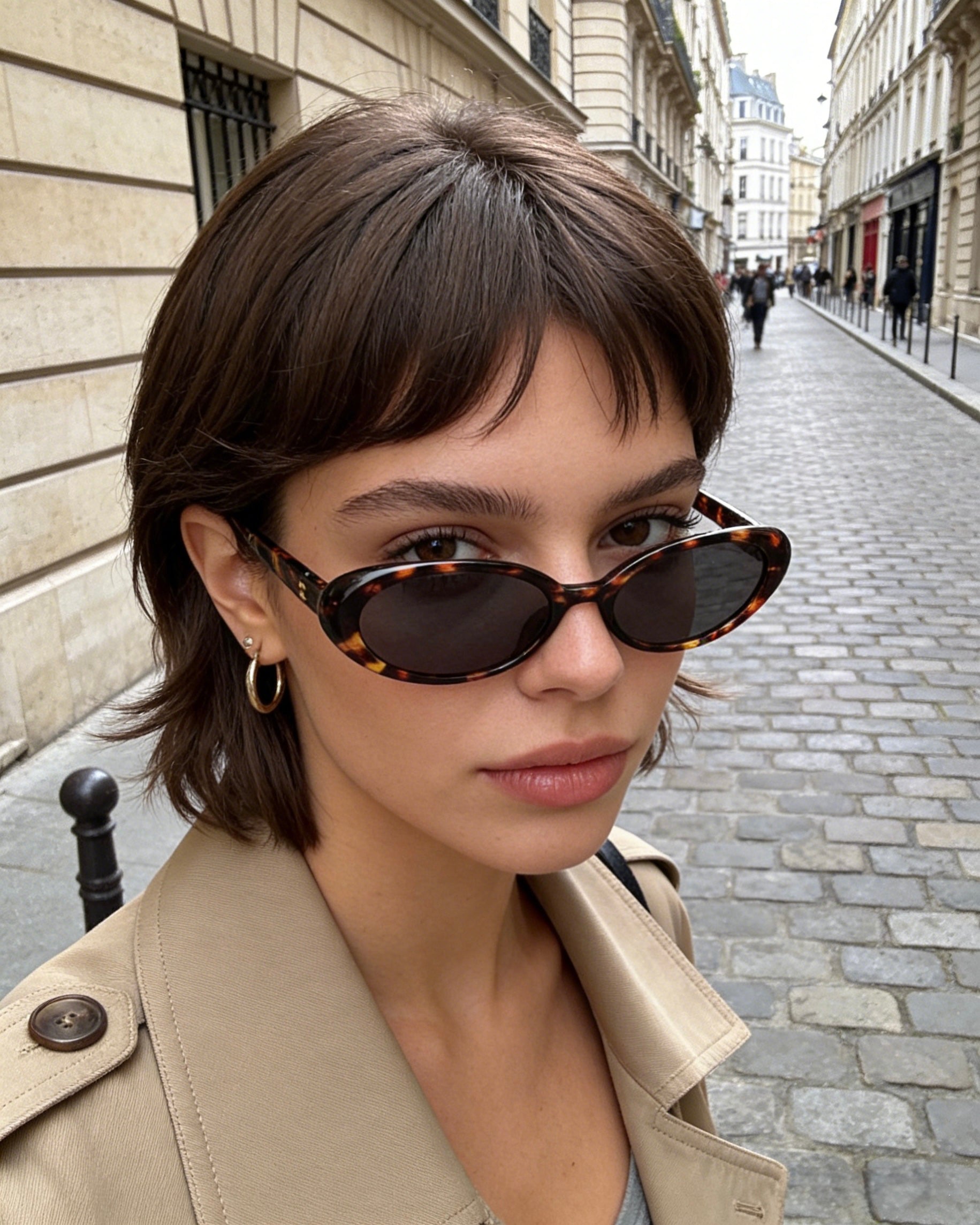 Pink Baby The Kyra tort sunglasses with rounded frames and dark lenses, stylish eyewear for fashion-forward looks.