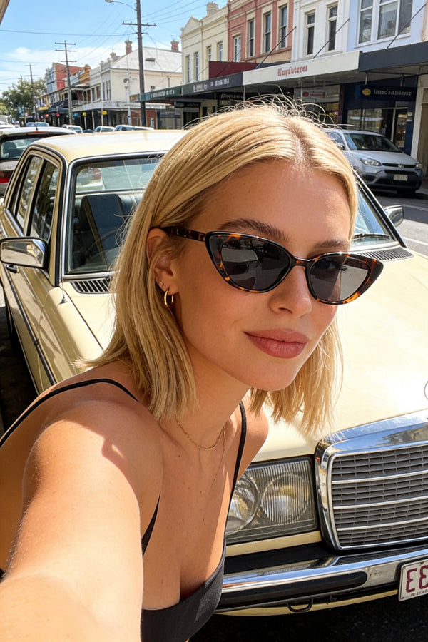 Pink Baby The Juno tort sunglasses featuring round frames and tinted lenses, stylish eyewear for sun protection.