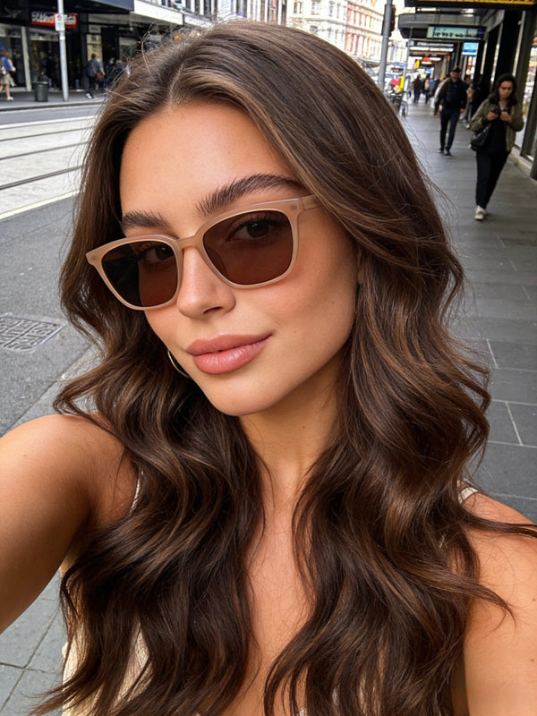 Pink Baby The Colton beige sunglasses with round frames and tinted lenses, stylish eyewear for sun protection.