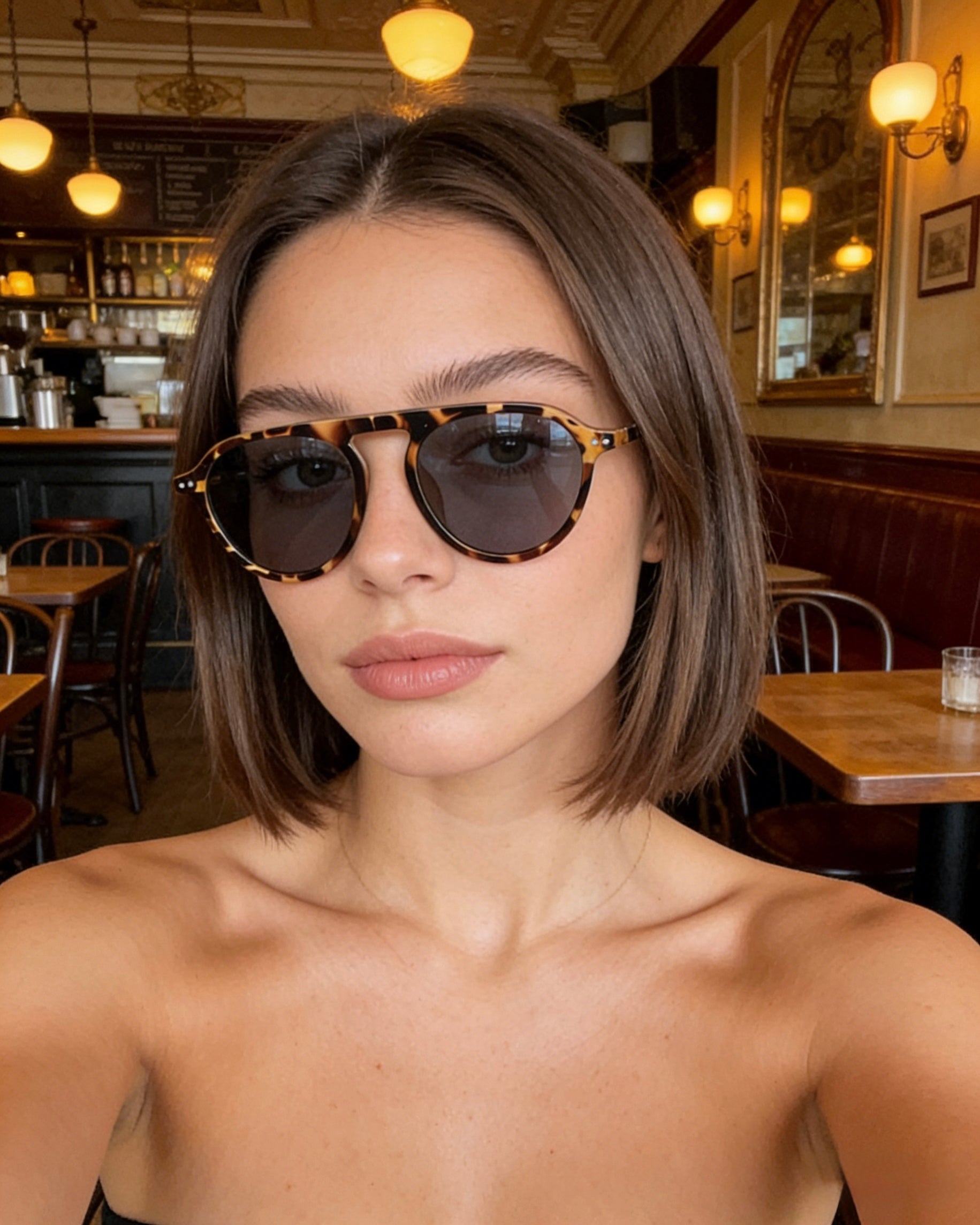 Pink Baby The Sage sunglasses with round tinted lenses and pink frames, stylish eyewear for sun protection.