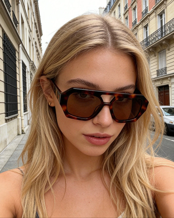 Pink Baby The Orin sunglasses with round frames and tinted lenses, stylish eyewear for sun protection and fashion.