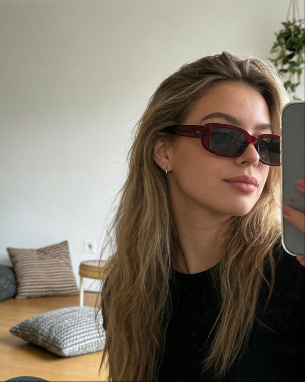 Pink Baby The Esme sunglasses with round tinted lenses and slim metal frames, stylish and fashionable eyewear for women.