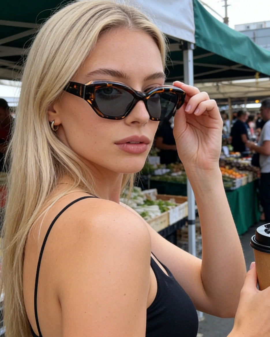 Pink Baby The Jamie tortoise shell sunglasses with round frames and tinted lenses, stylish eyewear for sun protection.