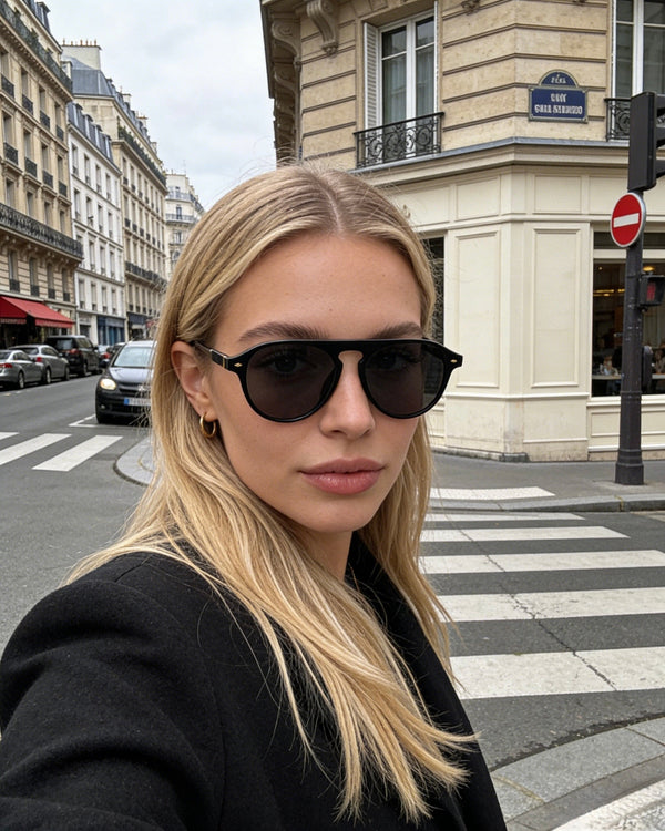 Pink Baby The Riley black sunglasses with round frames and dark lenses, stylish and trendy eyewear for women.