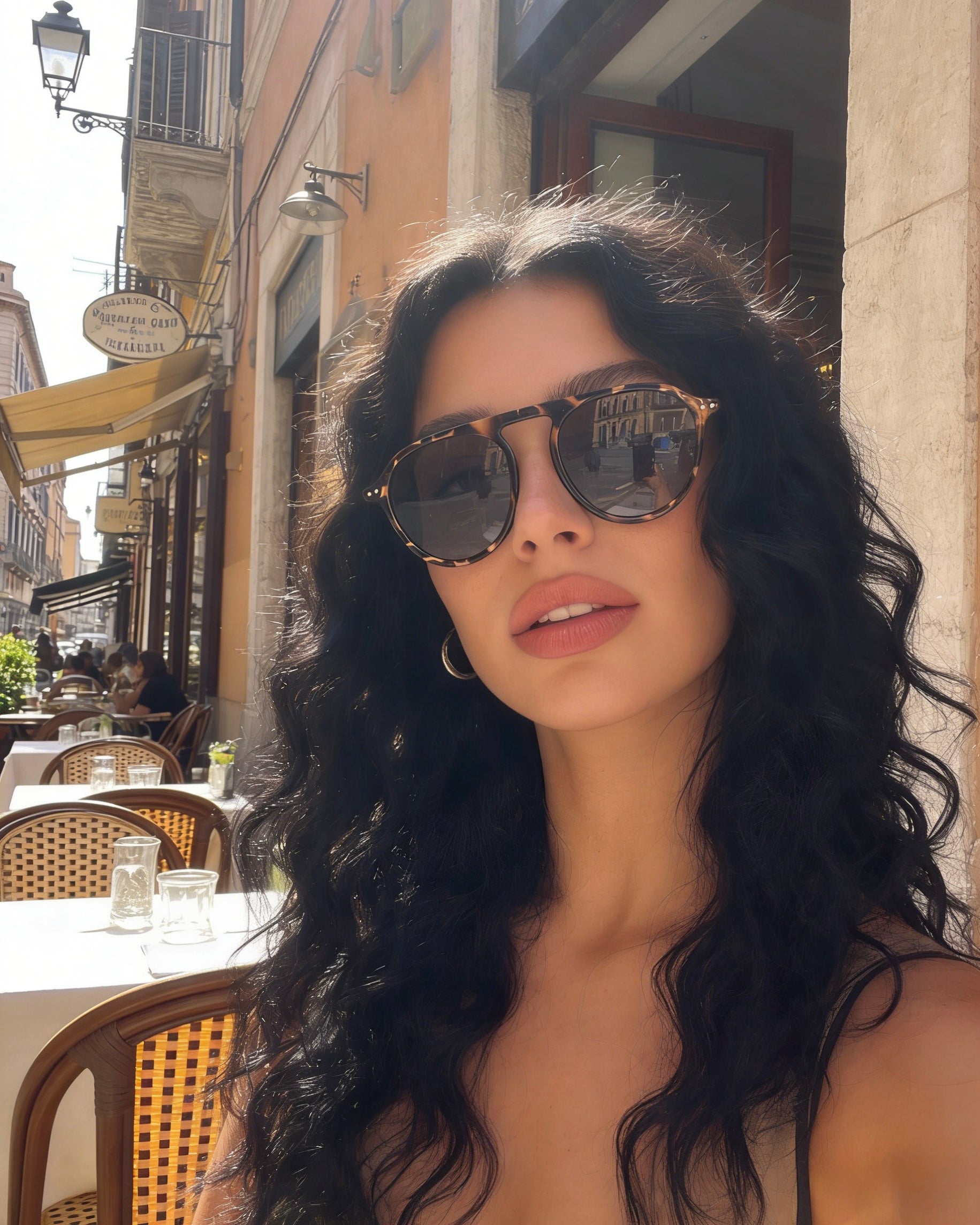 Pink Baby The Sage sunglasses with round frames and tinted lenses, stylishly displayed on a white background.